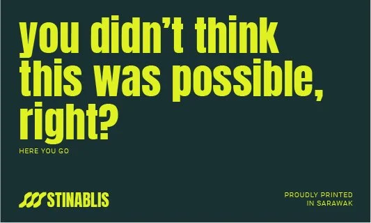 Bold yellow text on dark background that says 'You didn't think this was possible, right?' with smaller text below stating 'Here you go' and a logo for Stinablis, along with the phrase 'Proudly printed in Sarawak'.