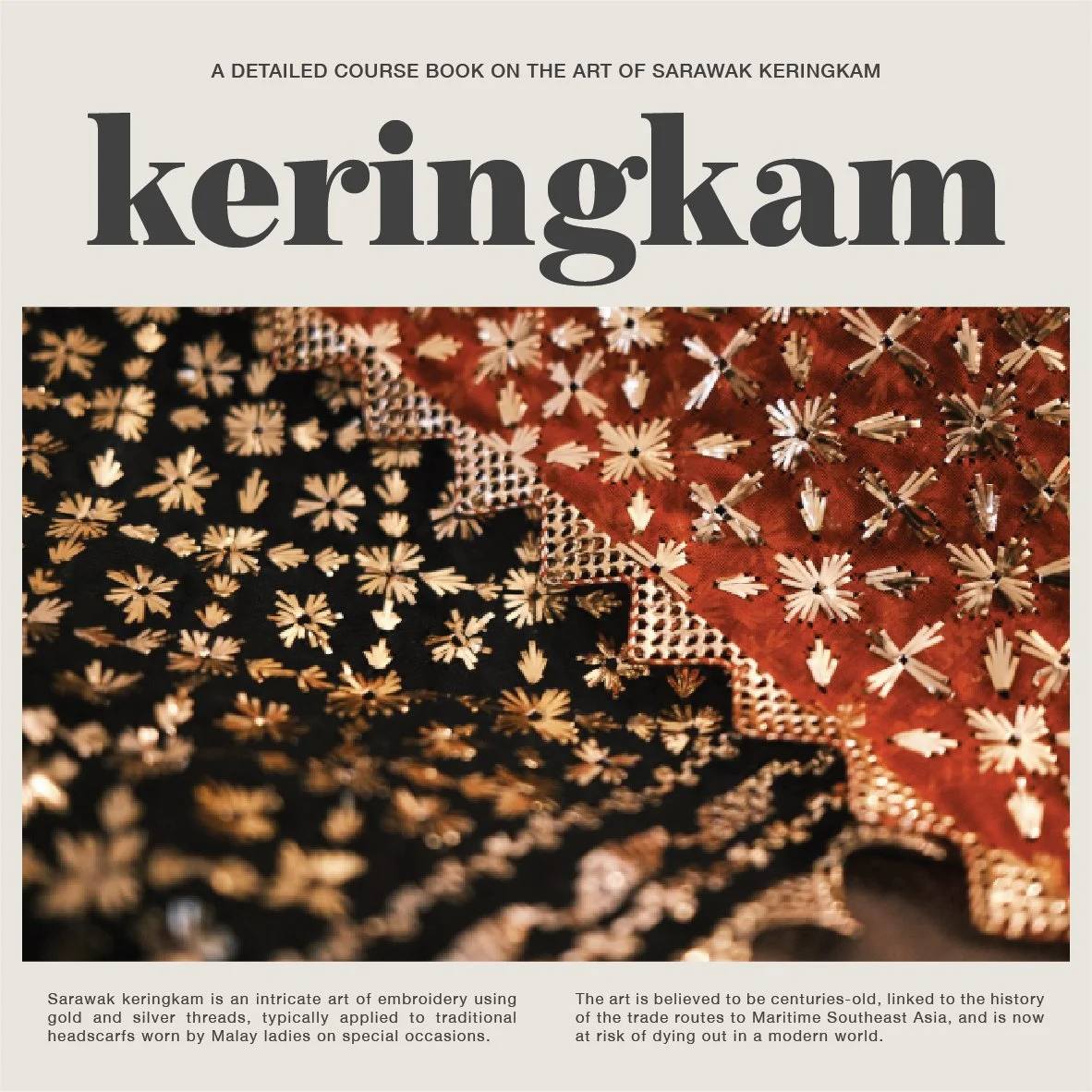 Close-up of embroidered Sarawak keringkam fabric with gold and silver threads and intricate floral patterns.