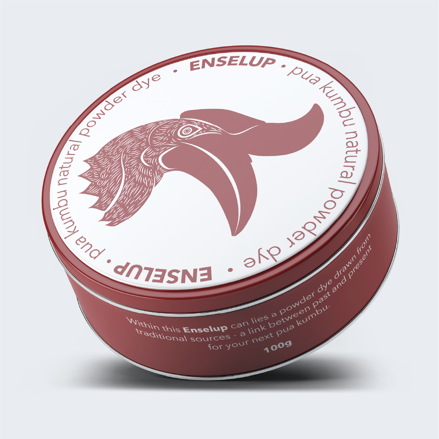 Red circular container of Enselup natural powder dye with a stylized bird head illustration on the lid and product description on the side, including details about traditional dye sourcing and weight.