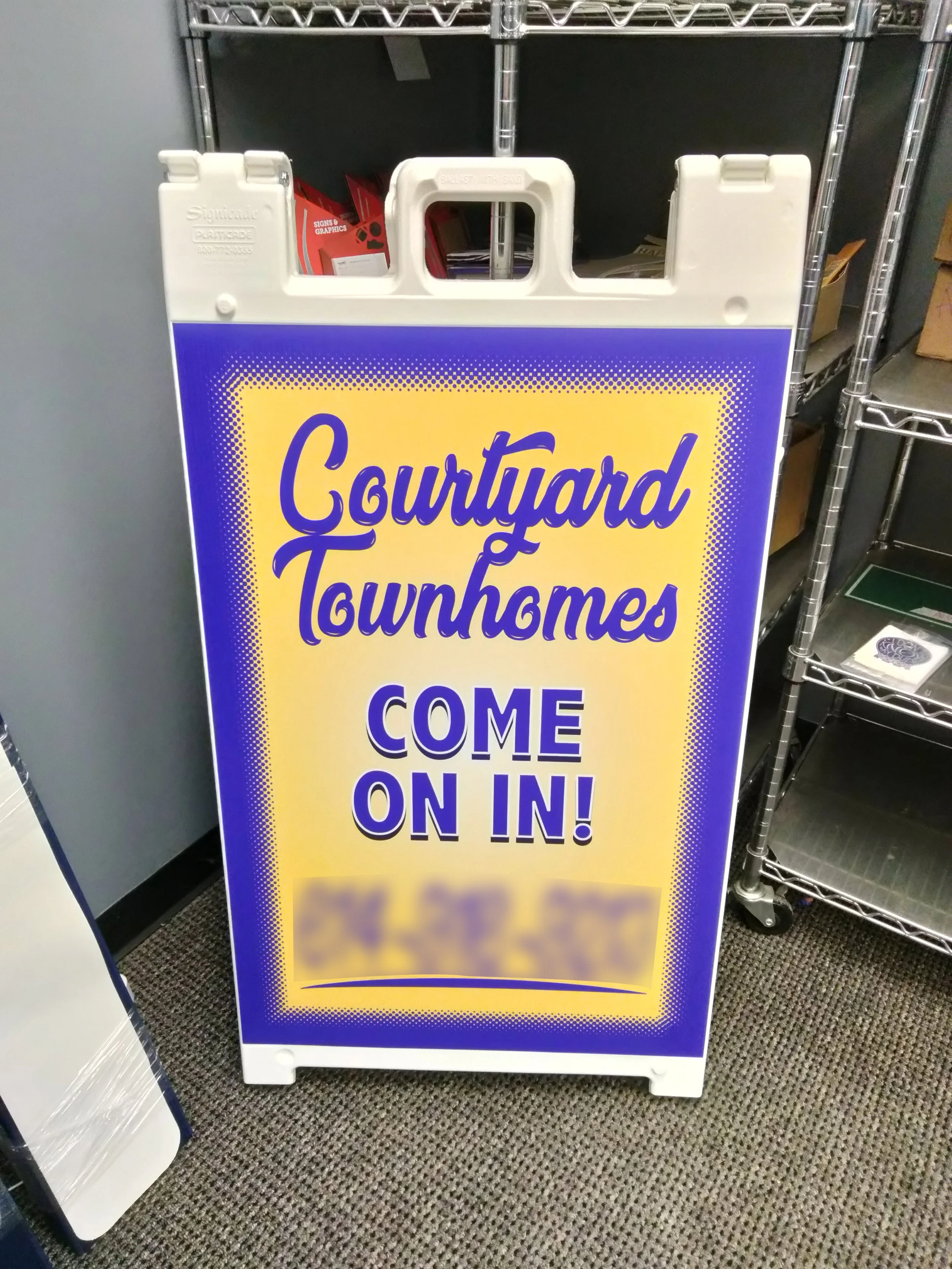 Sandwichboard + coro sign, designed and produced for a local realtor