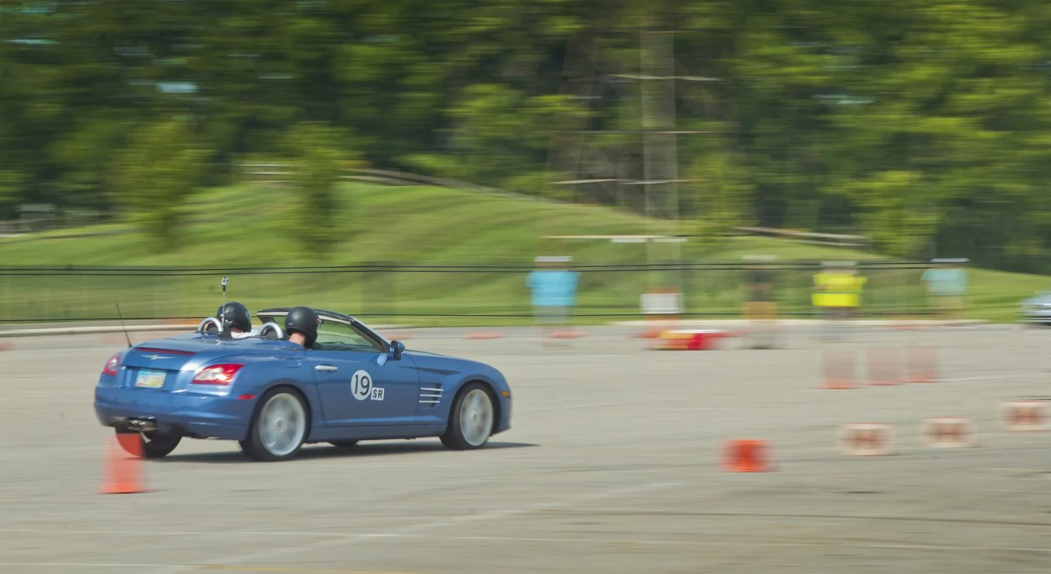 Photo taken at the SCCA Autocross event in Obetz Ohio, bringing to light the unique variety of cars that compete in these events (in this case a Chrysler Crossfire)
