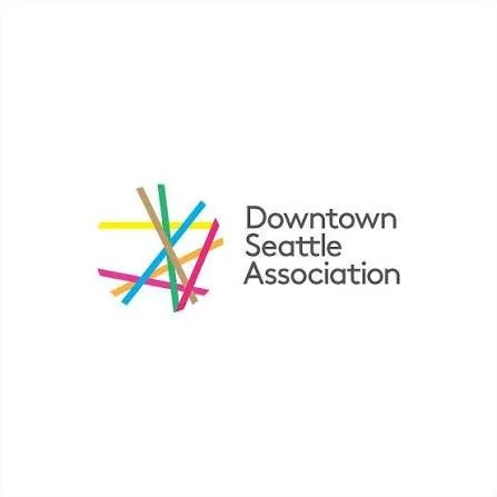 Colorful abstract shape resembling a city skyline next to the text 'Downtown Seattle Association'.