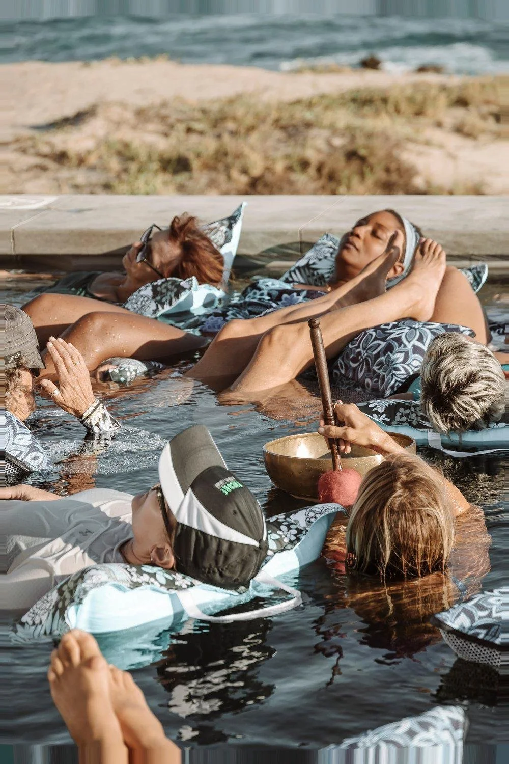 women-relaxing-in-pool-during-water-ceremony-baja.jpeg