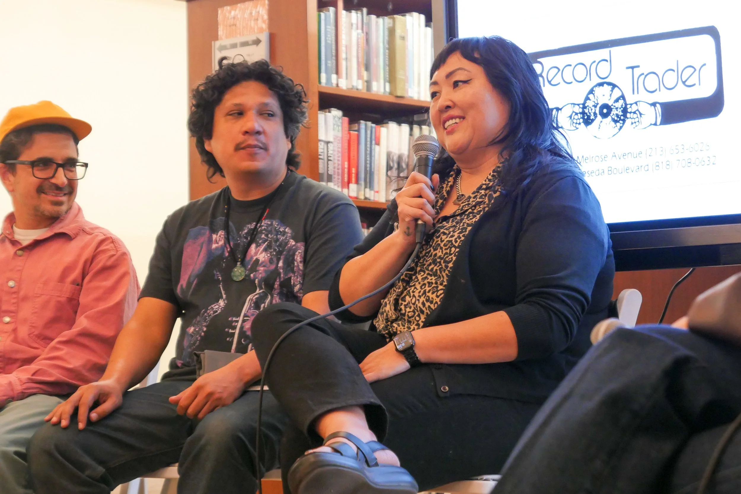 A photo of two panelists on stage