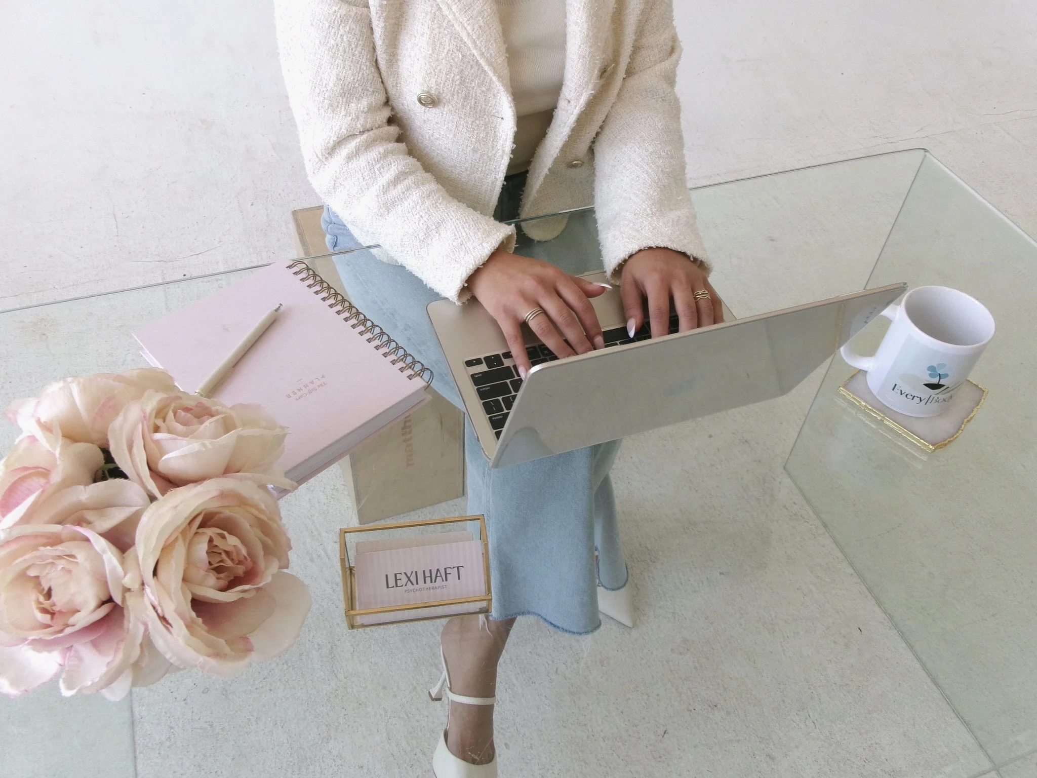 Lexi Haft, psychotherapist and founder of Wellhouse Therapy, creating mental health content.