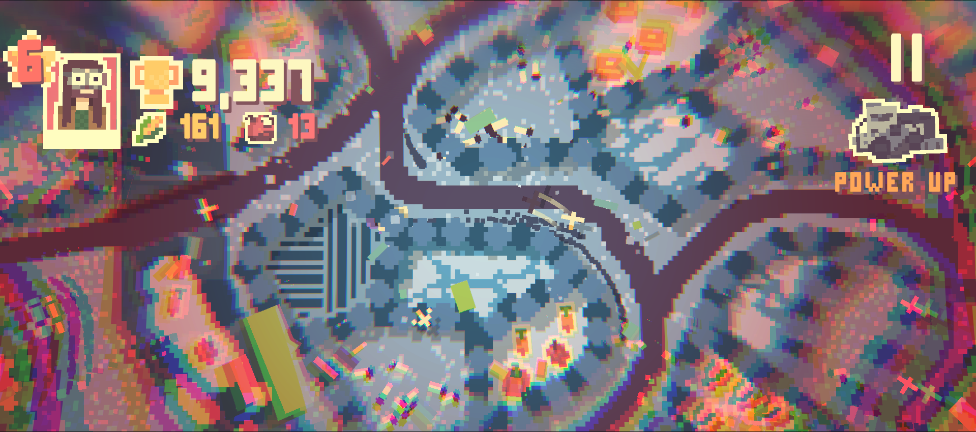 A pixel art-style video game screen displaying a colorful maze with various game icons, numbers, and text overlays, including 'POWER UP' and a timer.