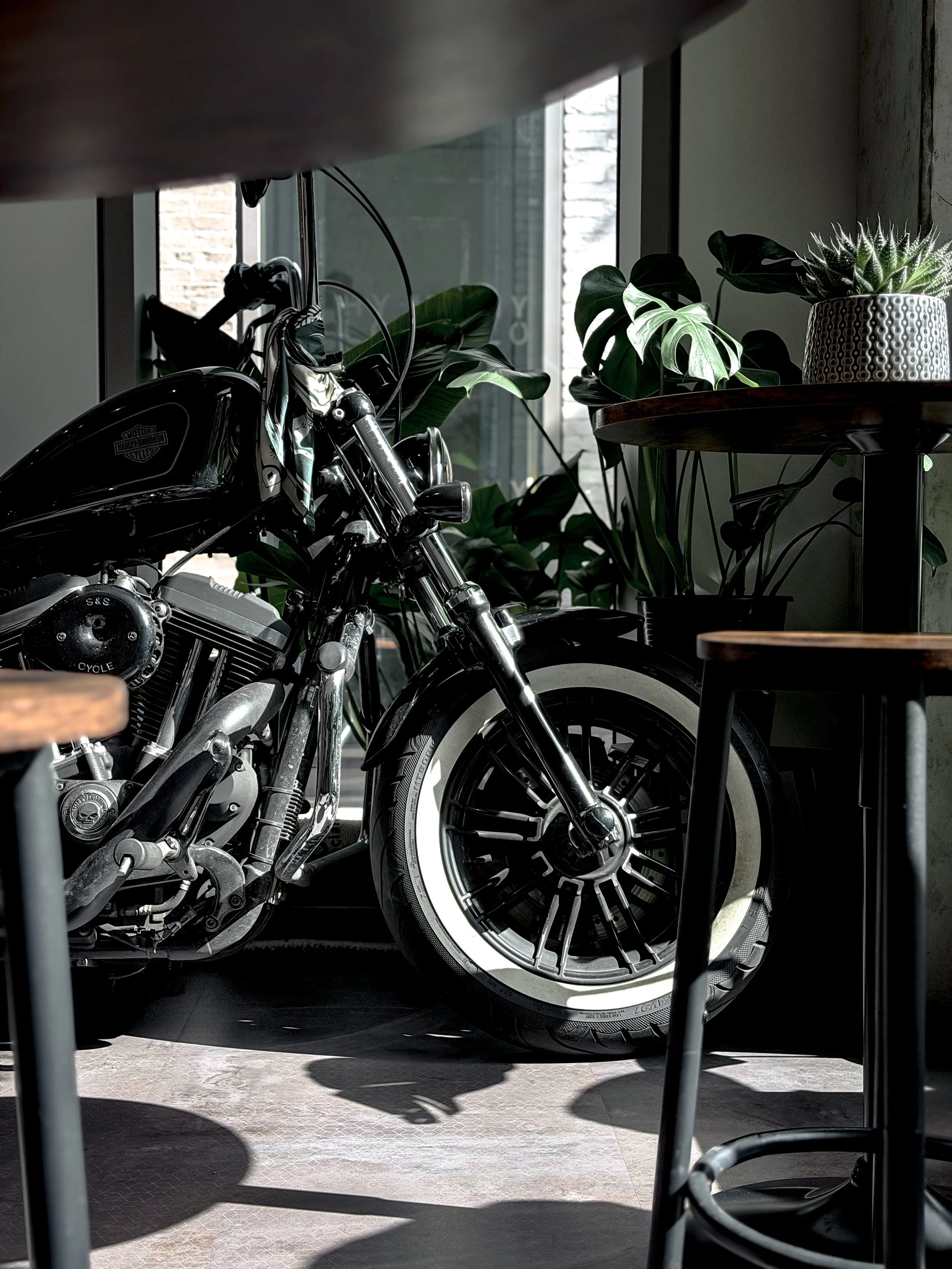 Harley Davidson Motorbike inside a cafe