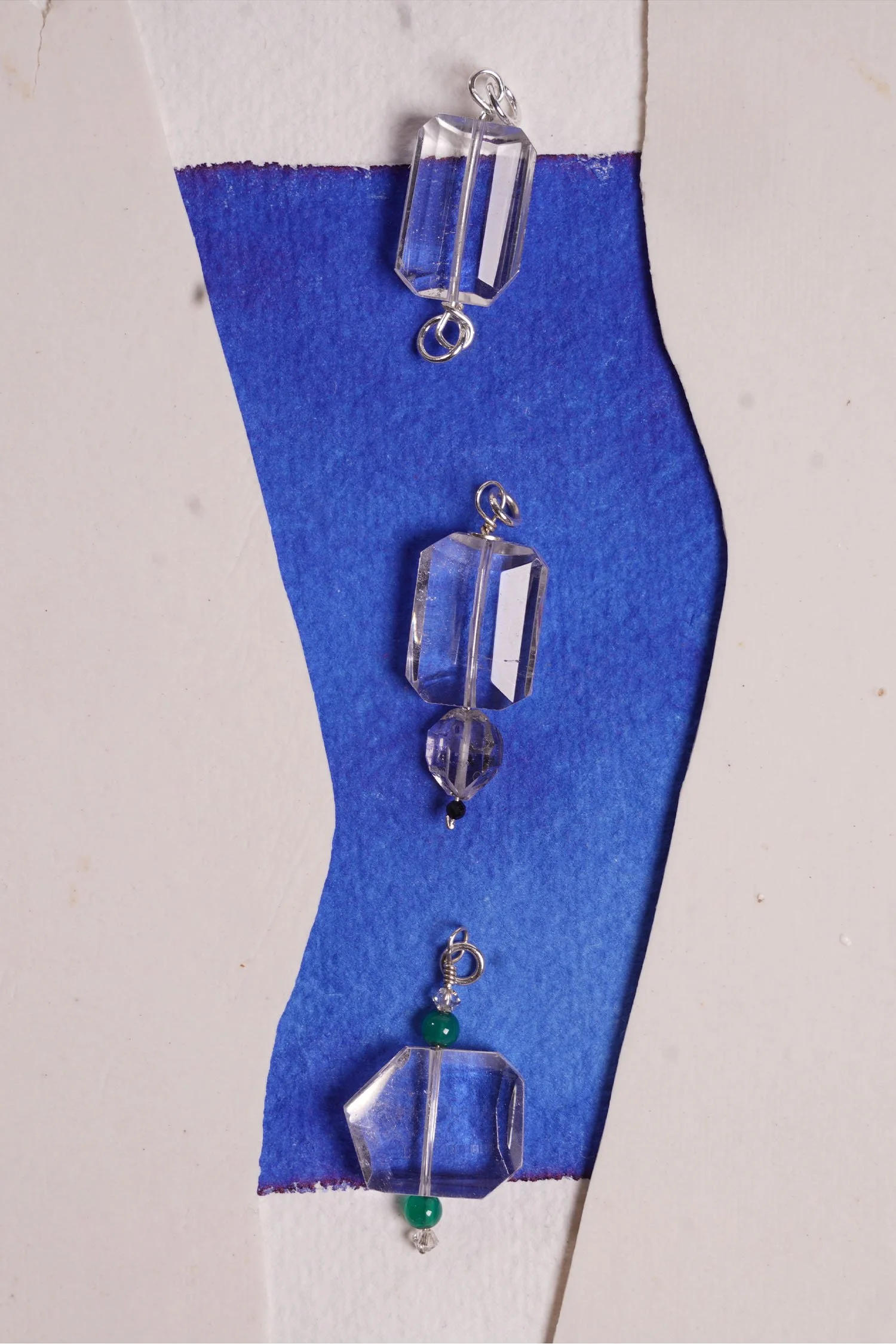 pendant set of 3 with blue backround and clay.jpg