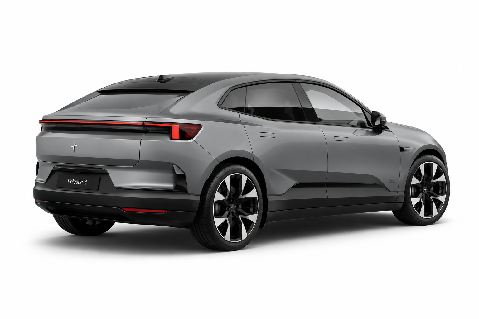 Gray electric Polestar 4 car with sleek design and black accents, photographed from the rear side against a white background.