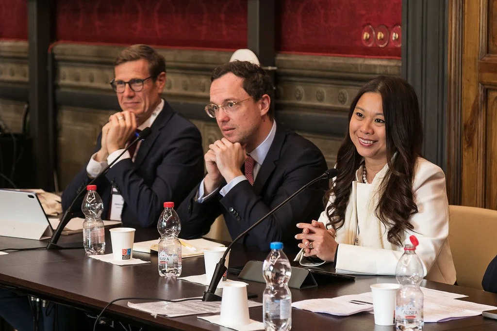Closing roundtable speakers at the table: Gérardine Goh Escolar, Arthur Rossi and Marino Vollenweider. Sala Rossa, Villa Ruspoli, 10 May 2025. Photo: Andrea Pecchioli / Fotoproject.