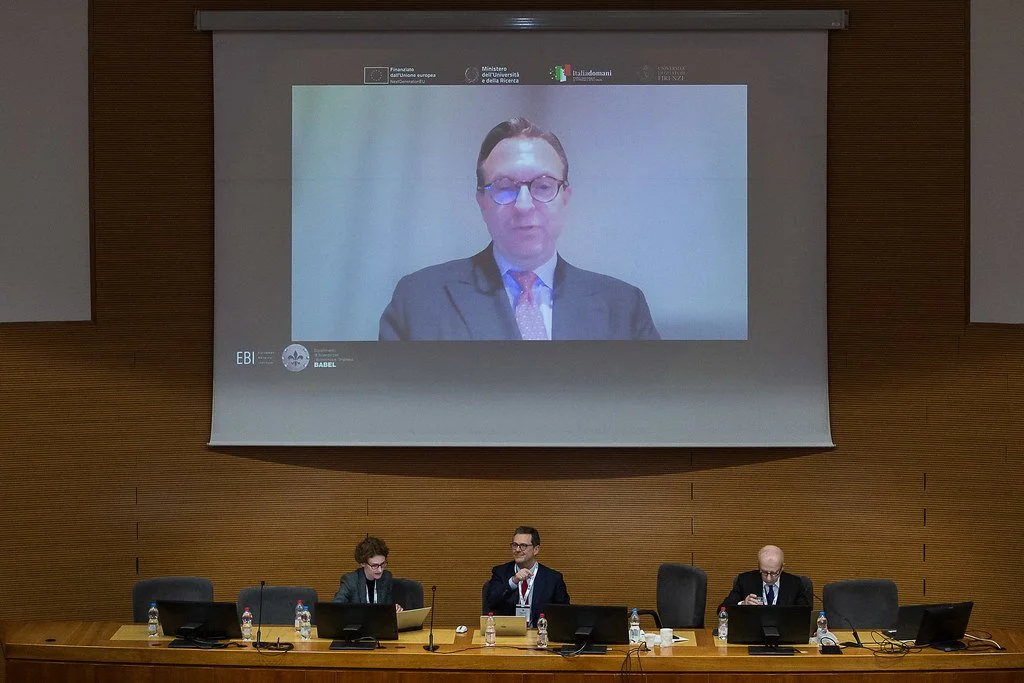 Douglas Arner (University of Hong Kong & EBI) joining Panel 1 remotely. Sala Convegni, Social Sciences Campus, 9 May 2025. Photo: Serena Gallorini / Fotoproject.