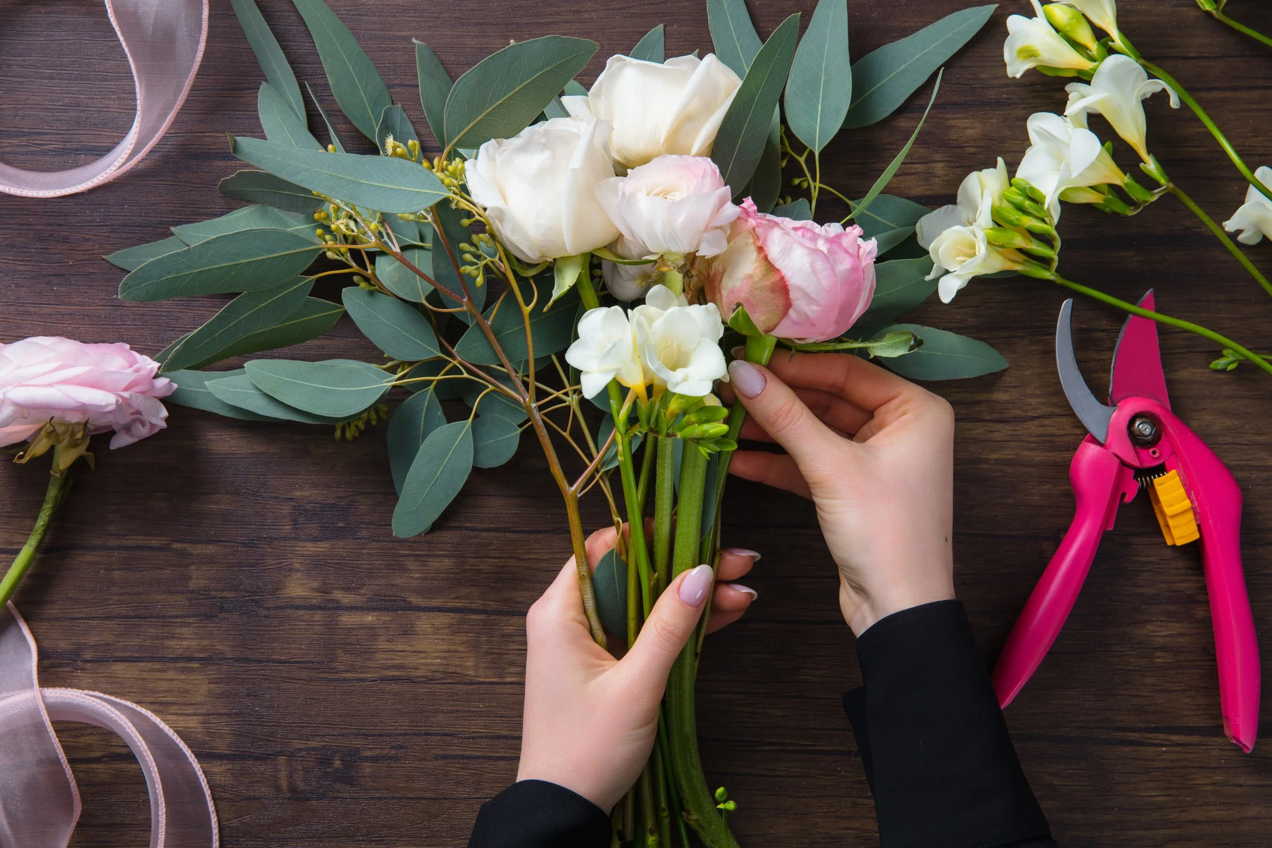 florist-work-woman-making-fashion-modern-bouquet-different-flowers-wooden-surface.jpg