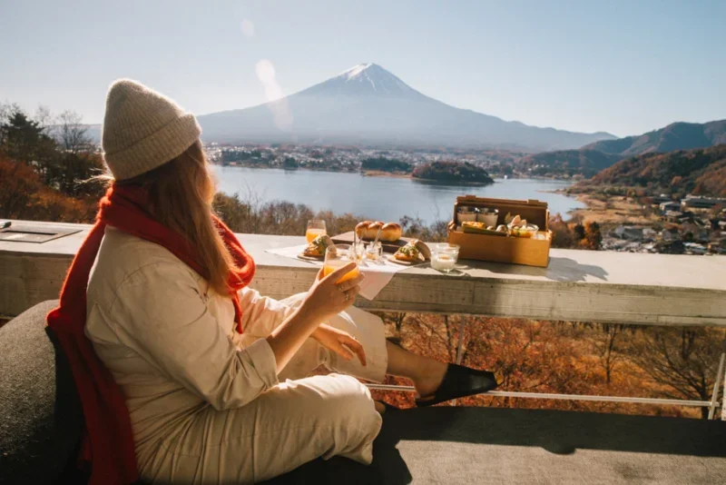 A traveler seated at terrace scenic view with no rush
