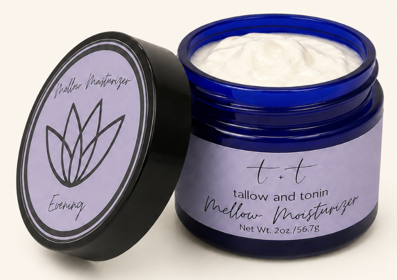 Open jar of T + T Tallow and Tonin Mellow Moisturizer with purple label and black lid, cream visible inside.