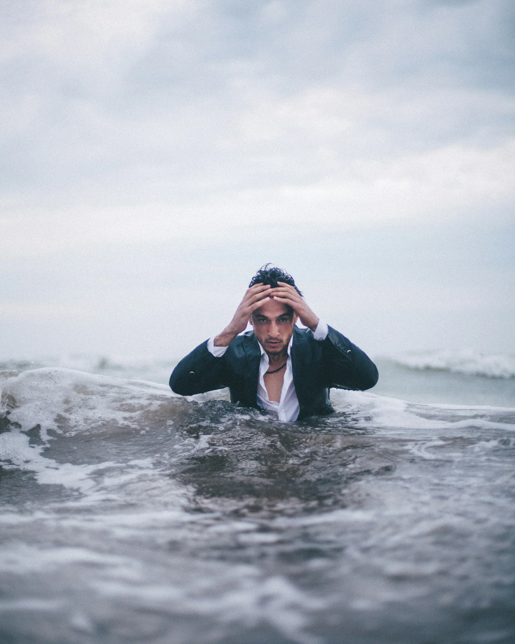 Business executive under water and in crisis over a business scandal.