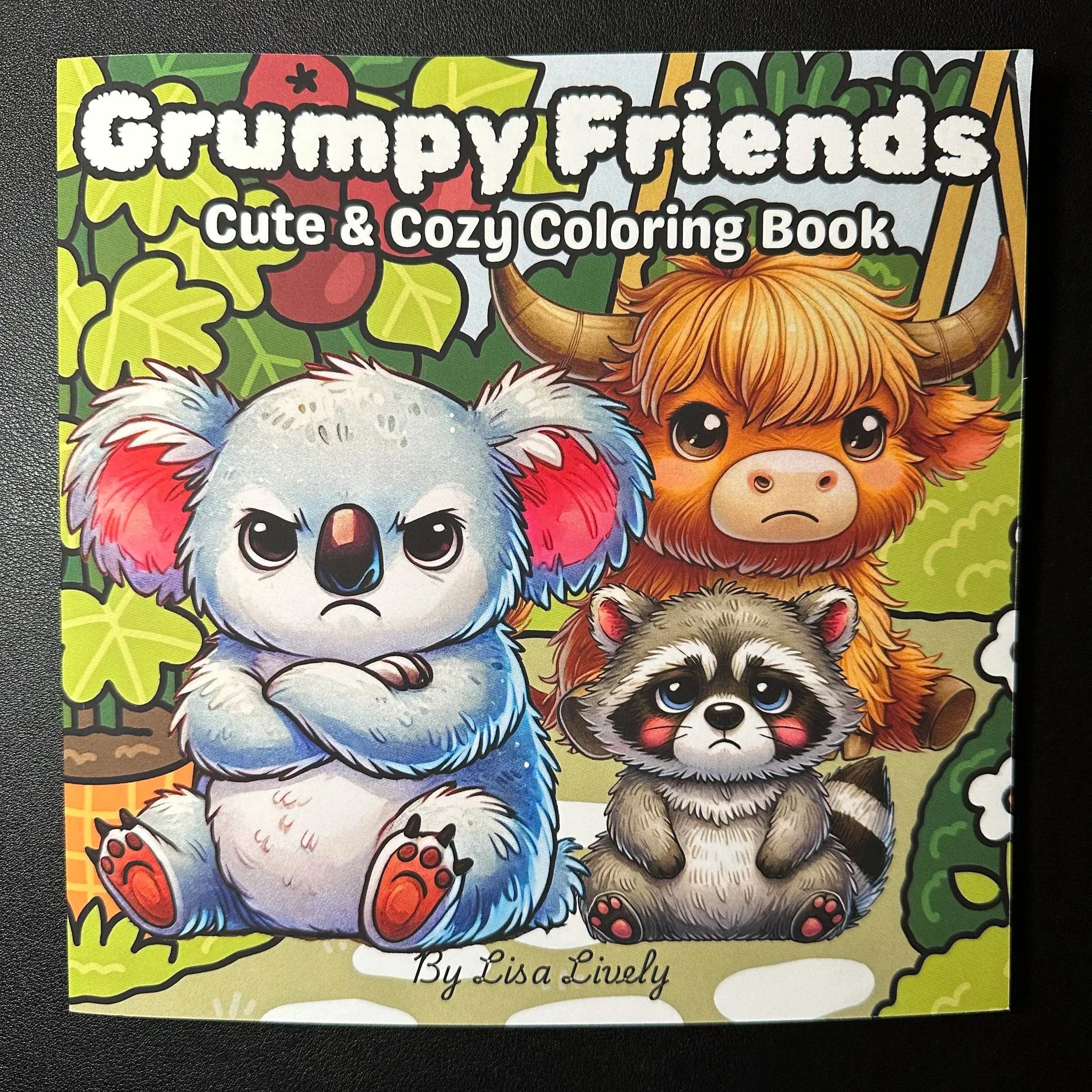 Colorful children's coloring book cover featuring cartoon animals including a koala, a lion, and a raccoon on a green and yellow background with leaves and trees. The title reads "Gummy Friends" with the subtitle "Cute & Cozy Coloring Book," and it is authored by Lisa Lively.