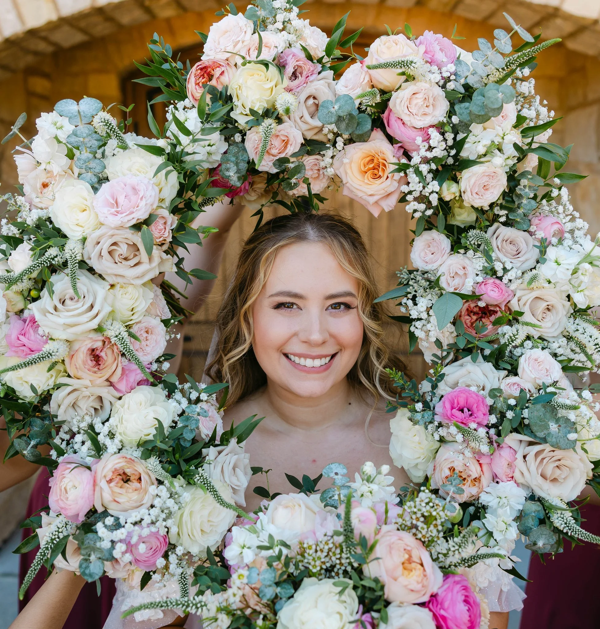 Bride with bouquets, Shades of pink.