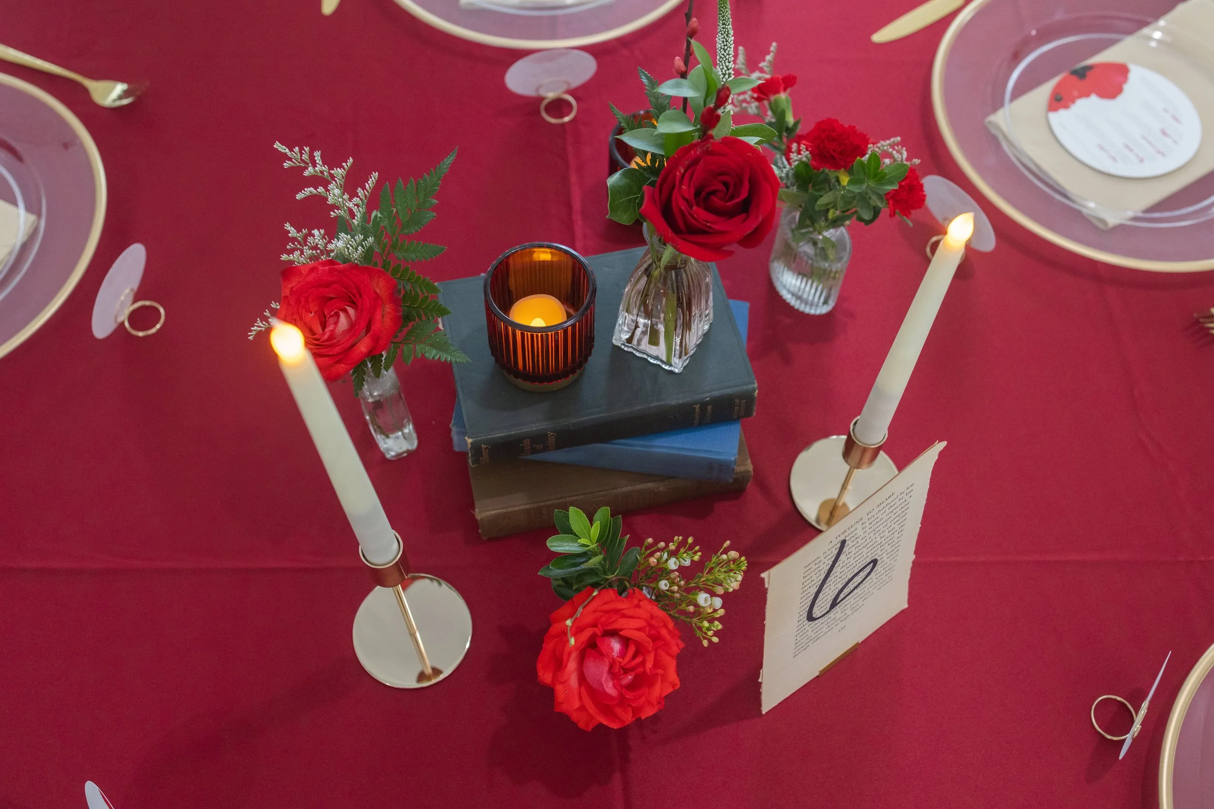 Simple bud vase and books centerpiece
