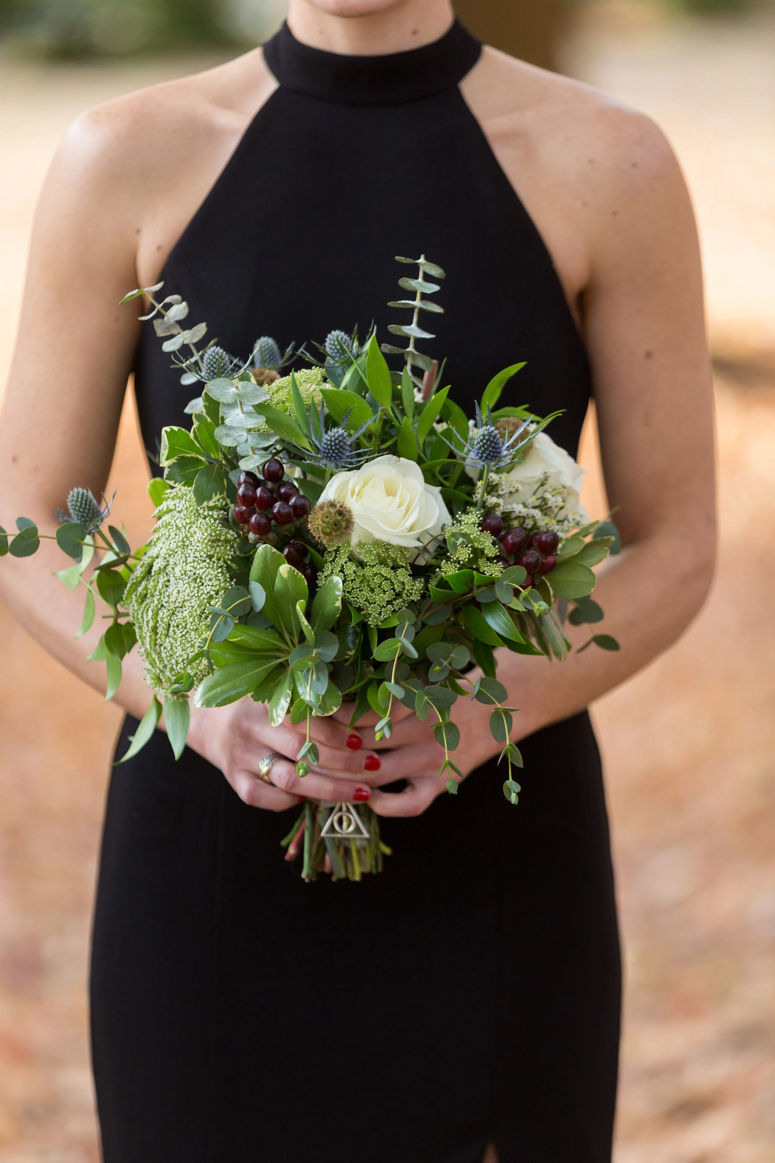 Greenery with white rose accent bridesmaid bouquet
