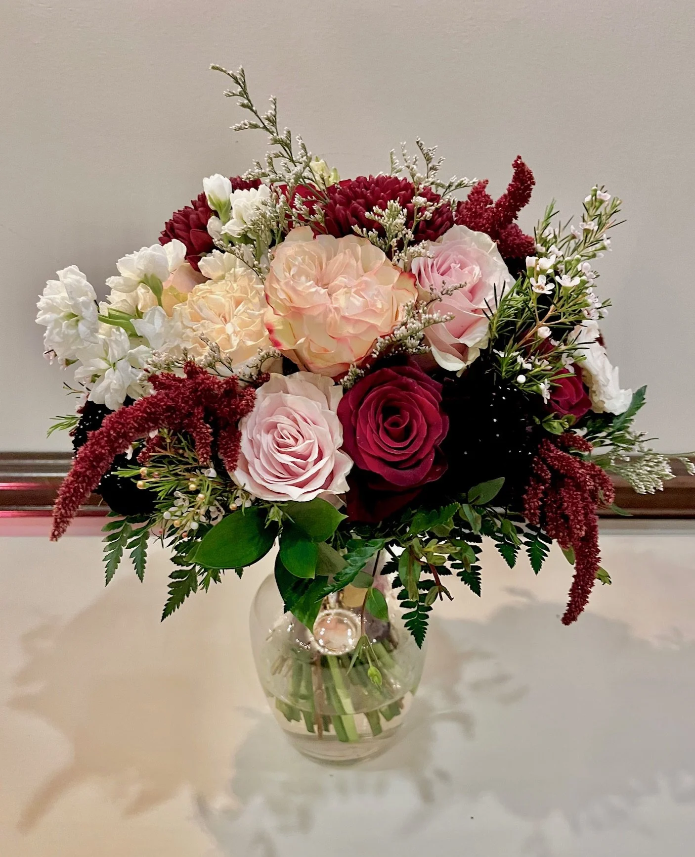 Shades of reds & pinks bridal bouquet