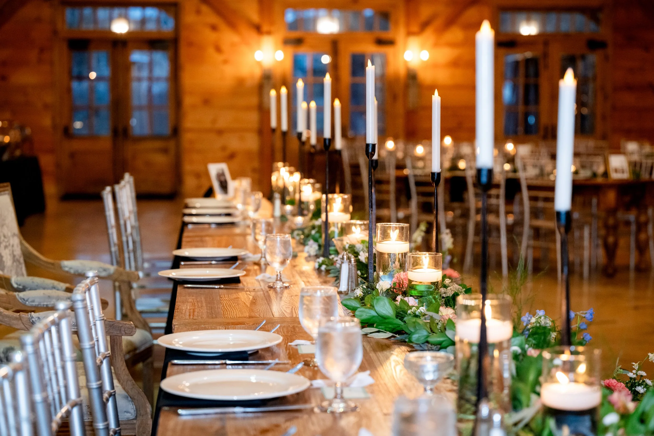 Head table greenery and tucked blooms