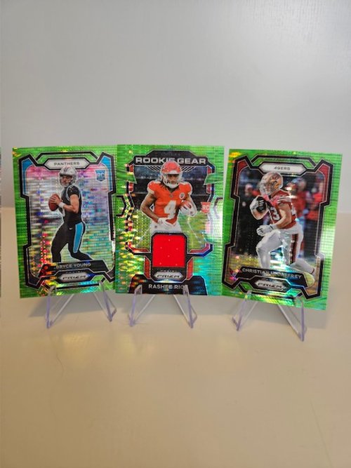 Rookie Gear Rashee Rice # RG-RR , Bryce Young RC # 311, Christian McCaffrey # 267