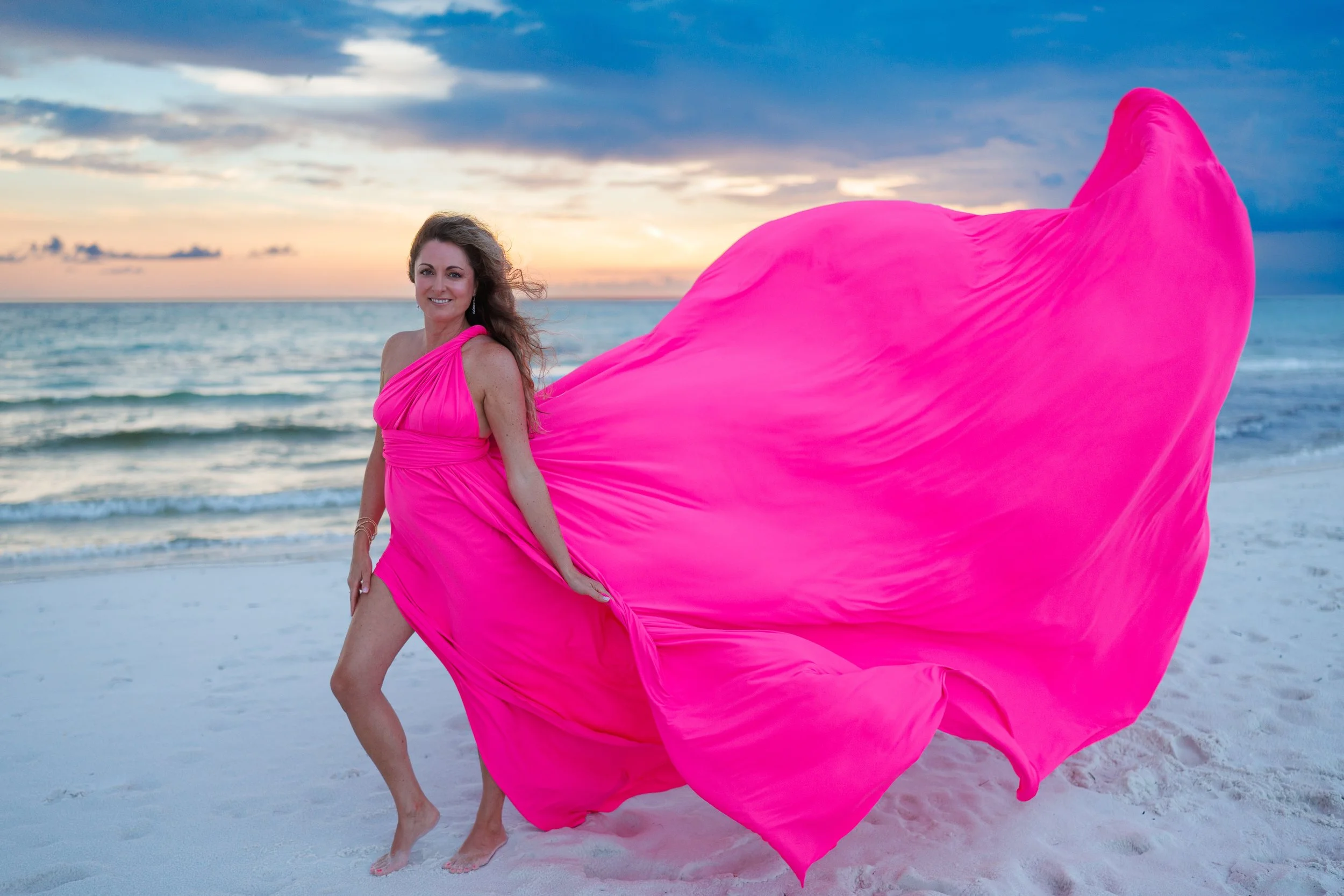 Hot Pink flying dress thunderstorm on beach