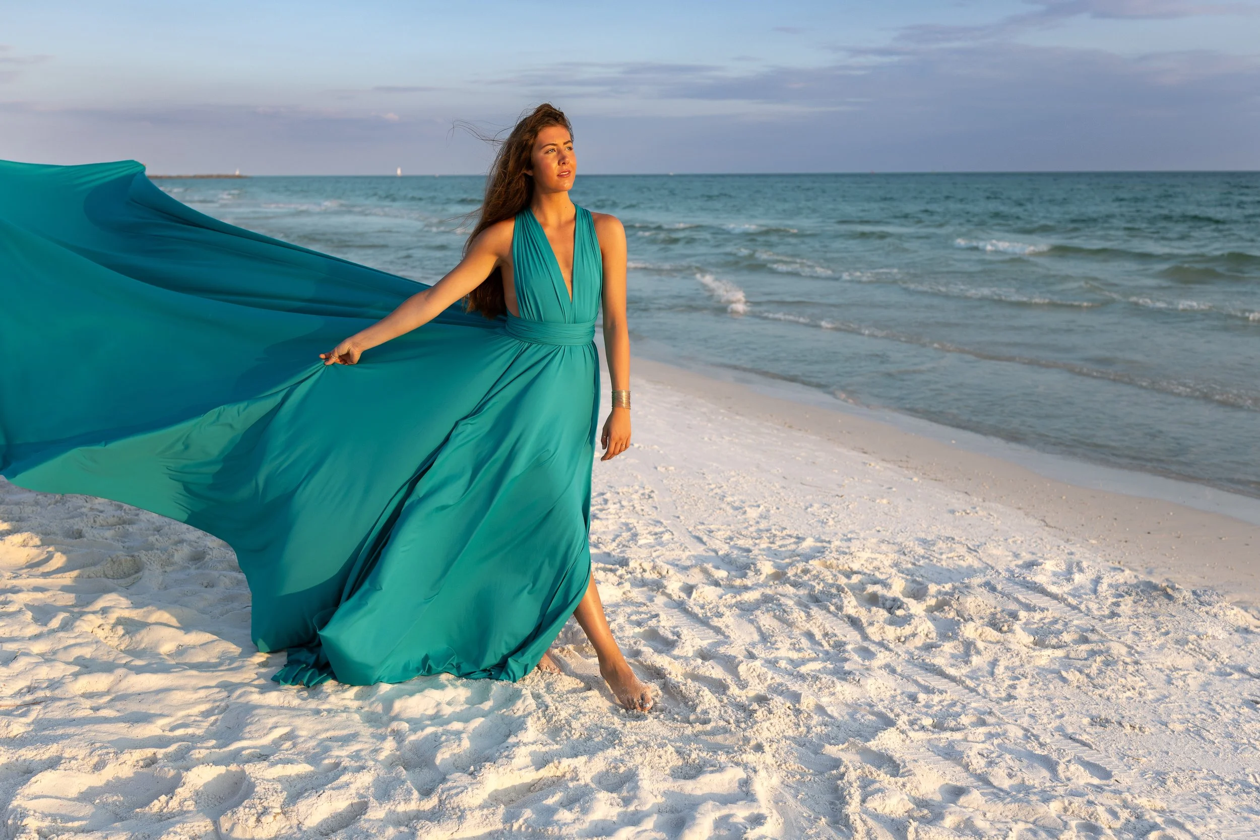 teal flying dress sunset beach waves