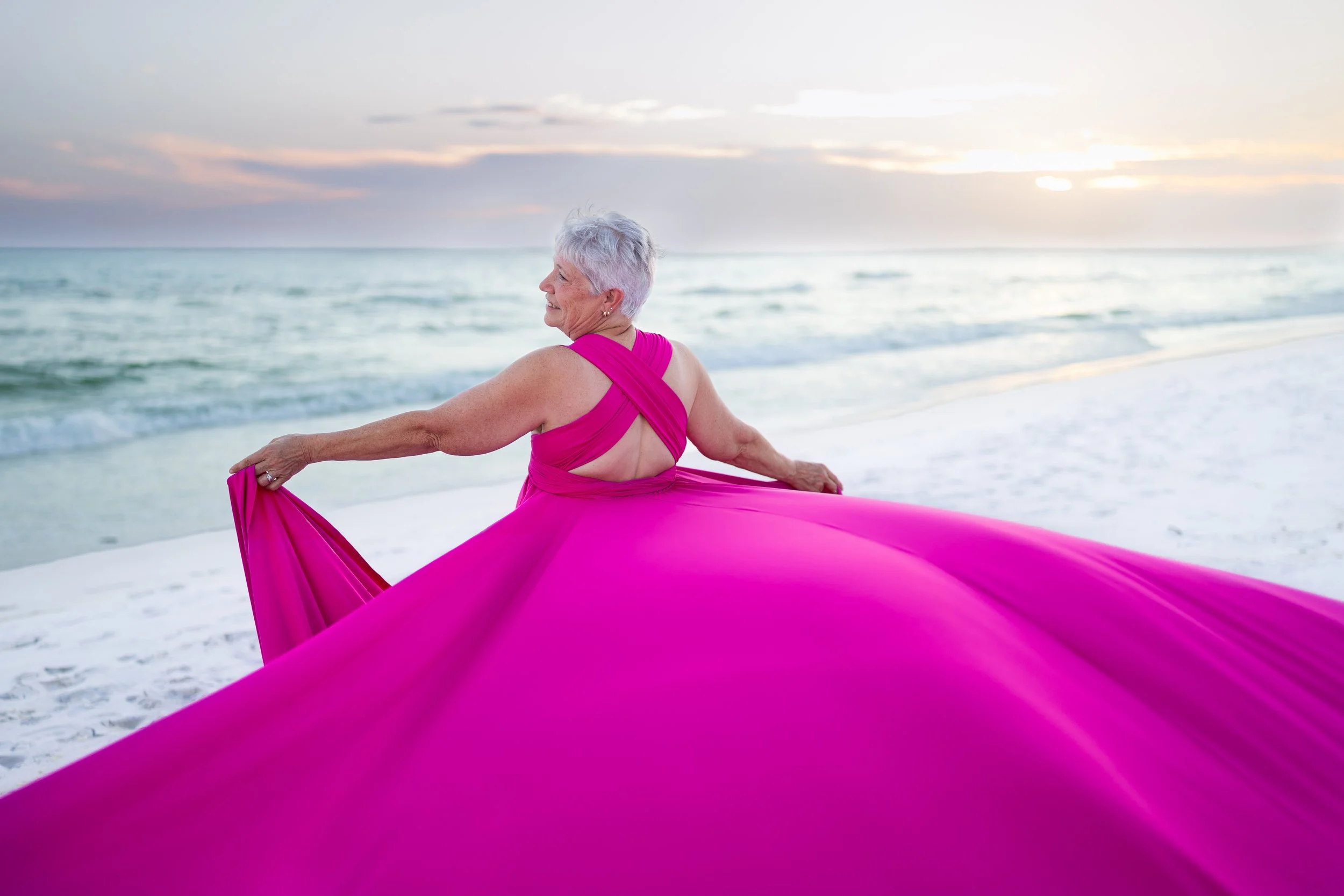 Breast cancer survivor flying dress photoshoot