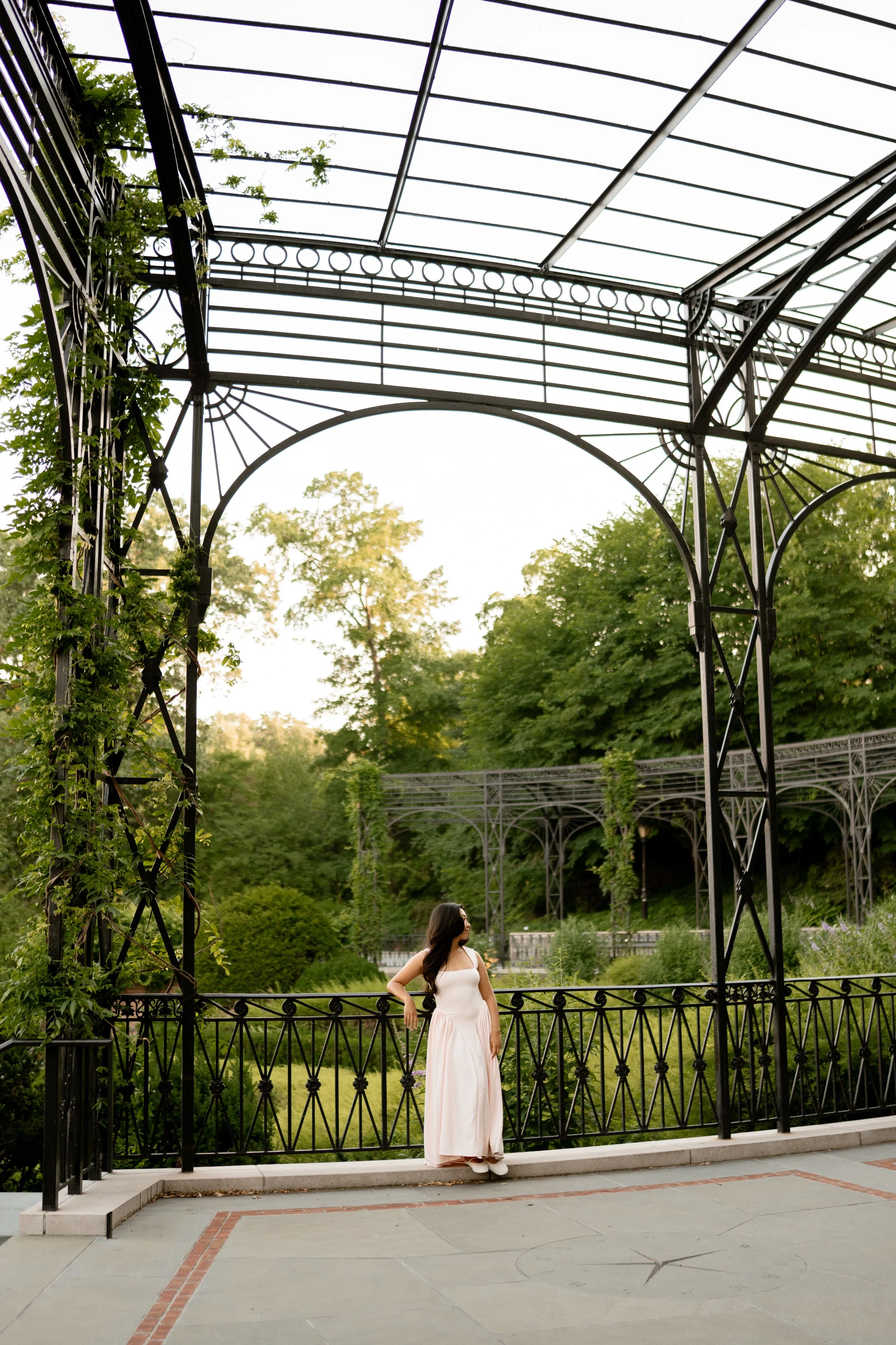 Calista Hennie, standing under a pavilion in Central Park.