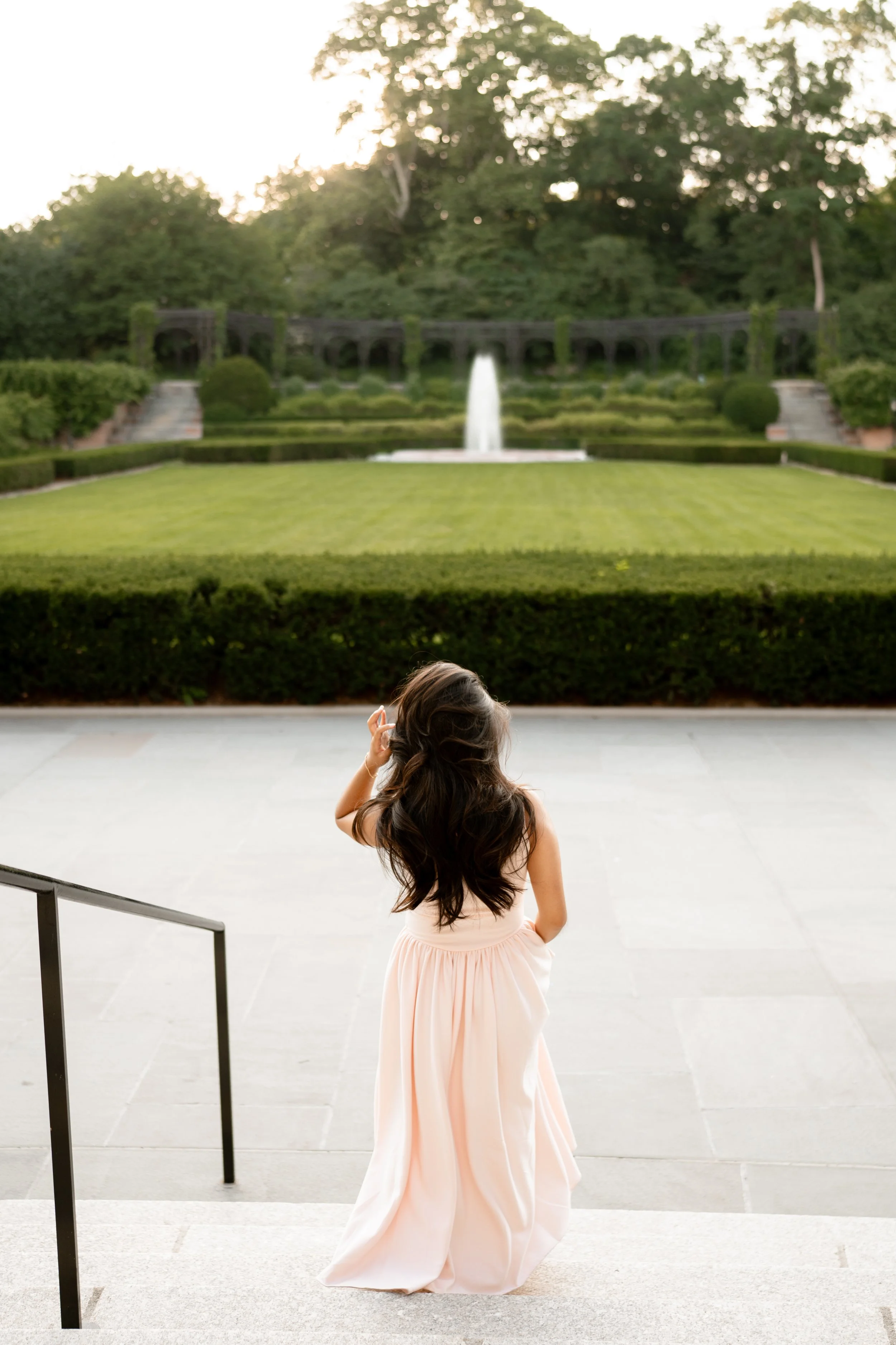 Calista Hennie, looking out at a meadow in Central Park.