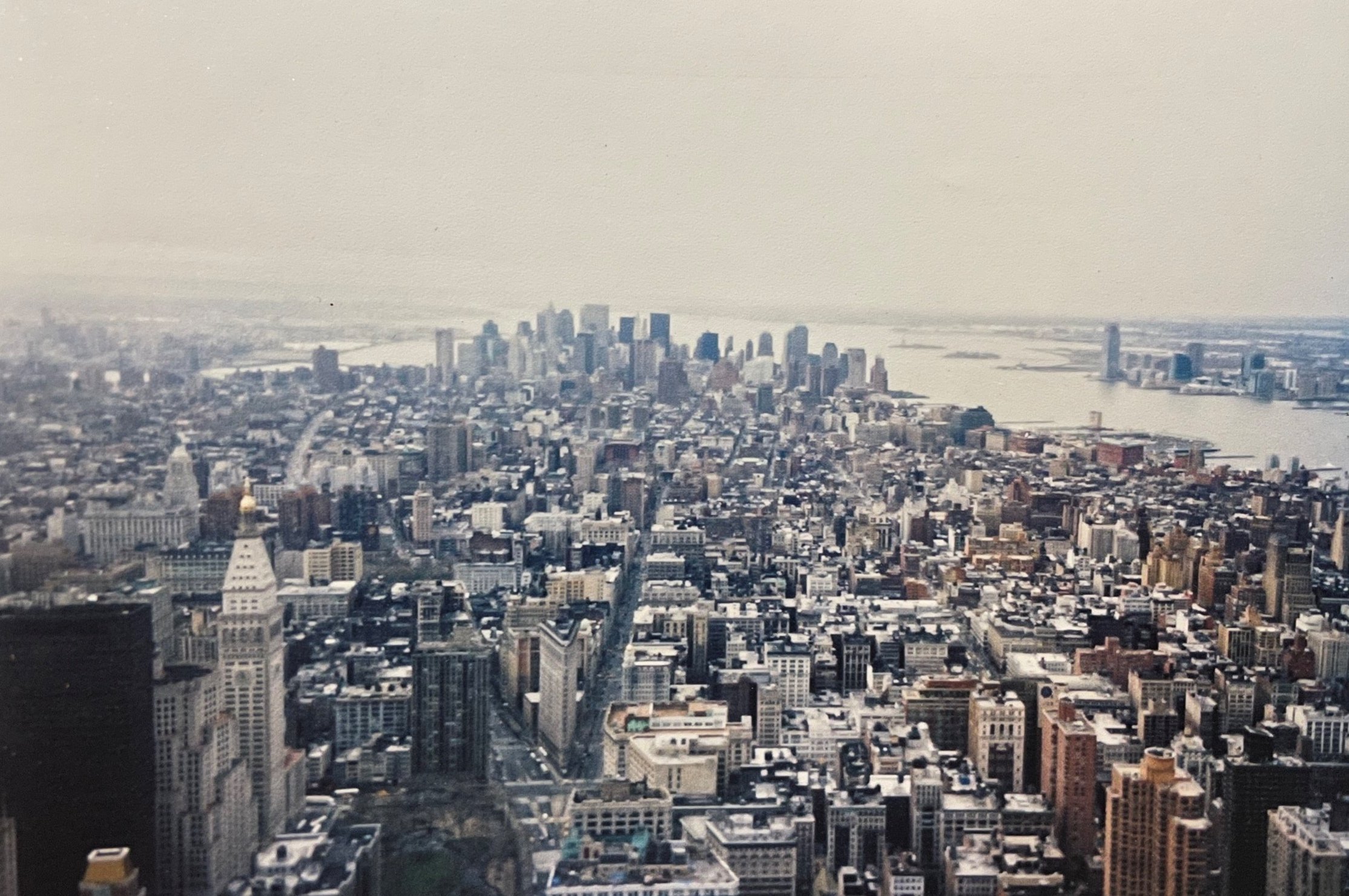 Cass and I looking towards lower Manhattan from the Empire State Building - April 2003