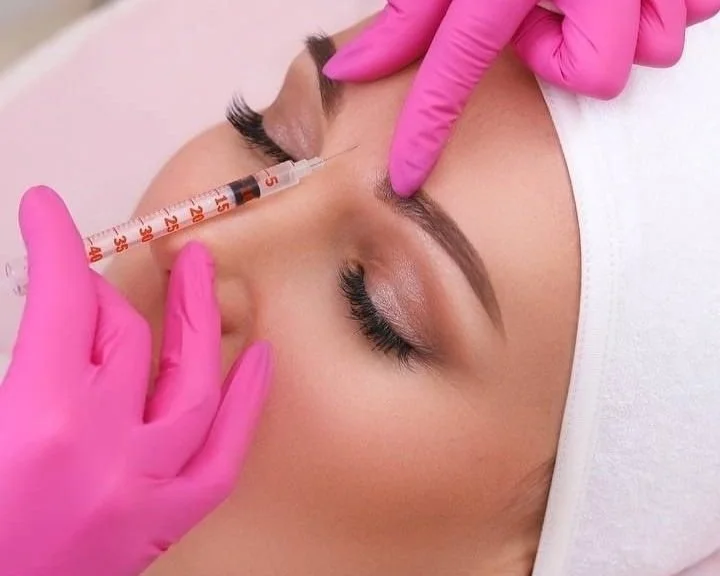Botox treatment at center for smoothing wrinkles, reducing fine lines, and restoring a youthful appearance with personalized care from an expert team.