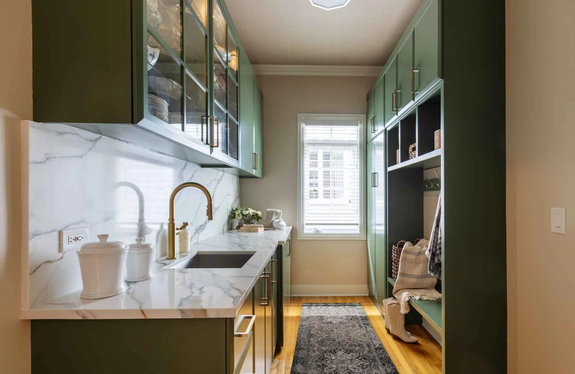 trisha-davis-designs-chicagoland-area-il-natural-materials-for-healthy-home-mudroom-with-green-cabinetry-stone-countertop-with-sink-meaningful.jpg