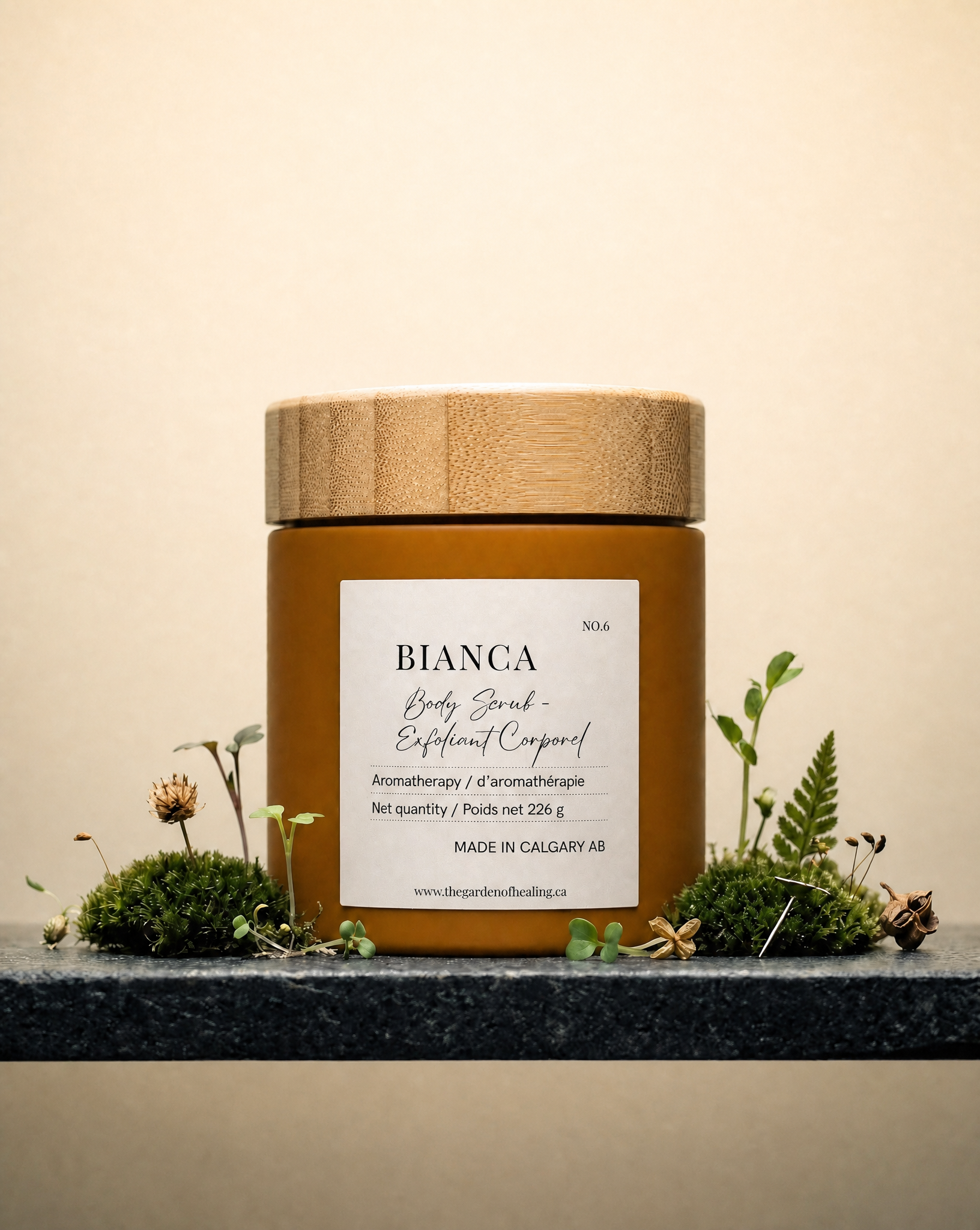 Experience Bianca: a unique apricot shell body scrub featuring Coconut, Vanilla, and Cinnamon. Designed by a Clinical Aromatherapist for deep emotional restoration and glowing skin.