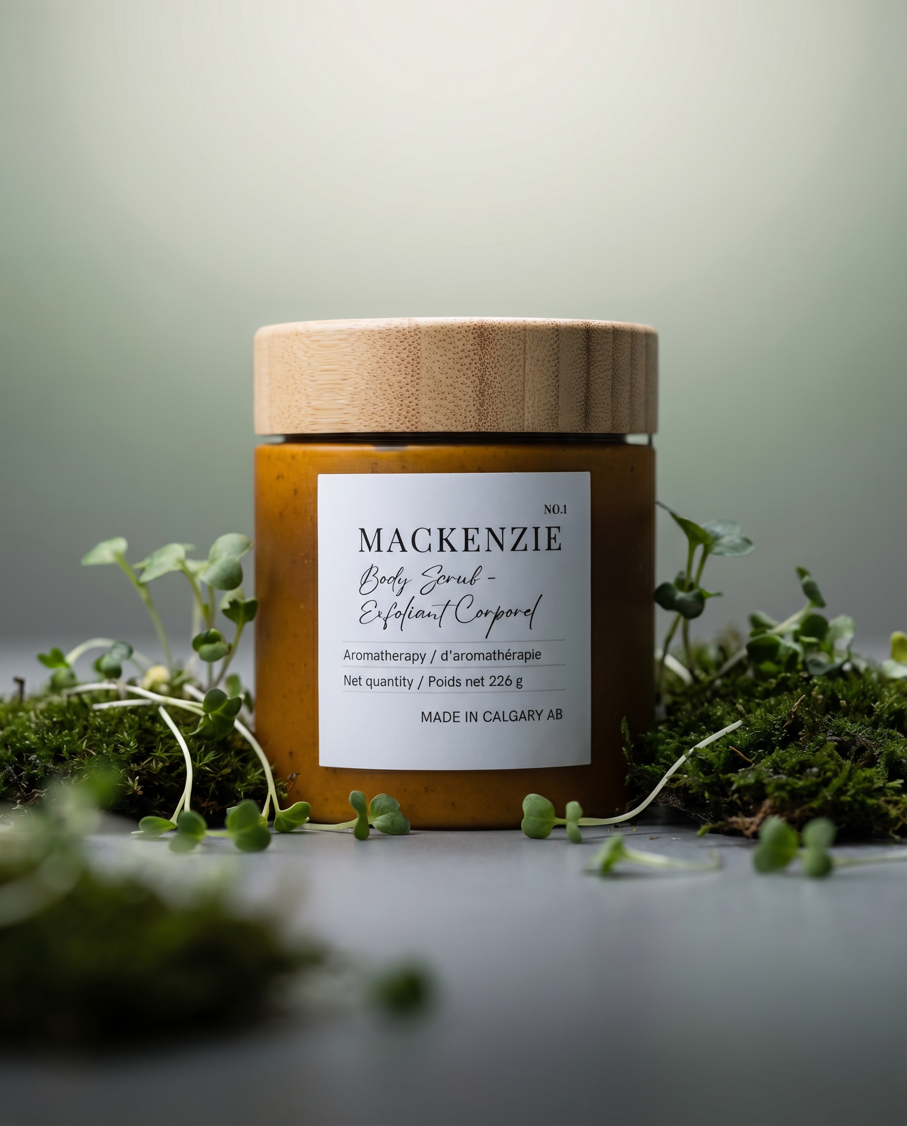 Macro view of Mackenzie Body Milk Scrub texture showing finely ground natural apricot shells for precision mechanical resurfacing.