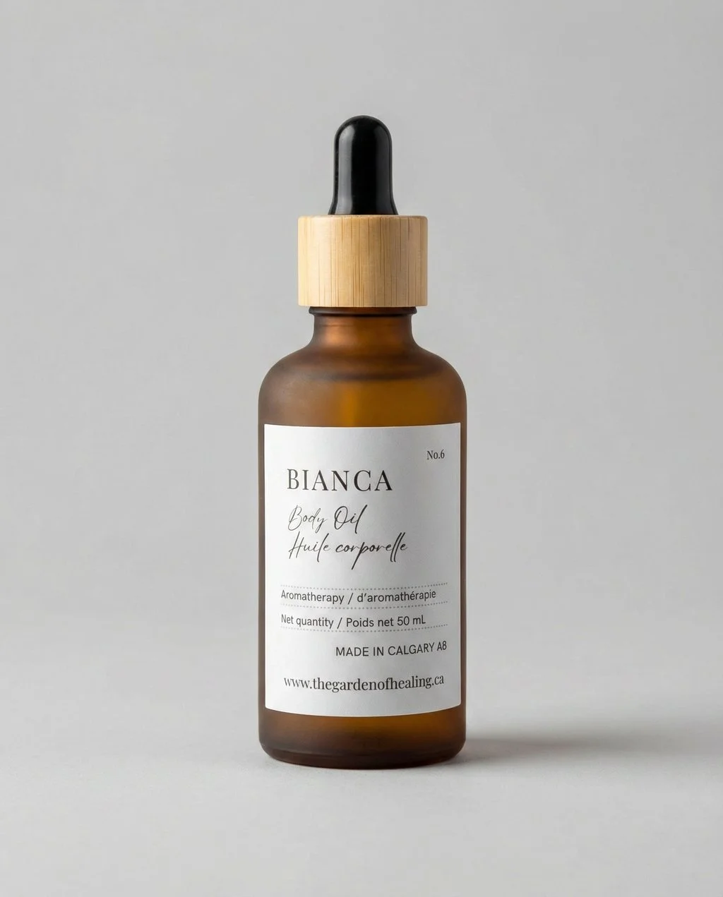 Bianca body oil, spiced coconut body oil, peach vanilla body oil, cinnamon scented body oil, warm tropical body oil, natural hydrating body oil, luxury body moisturizer.
