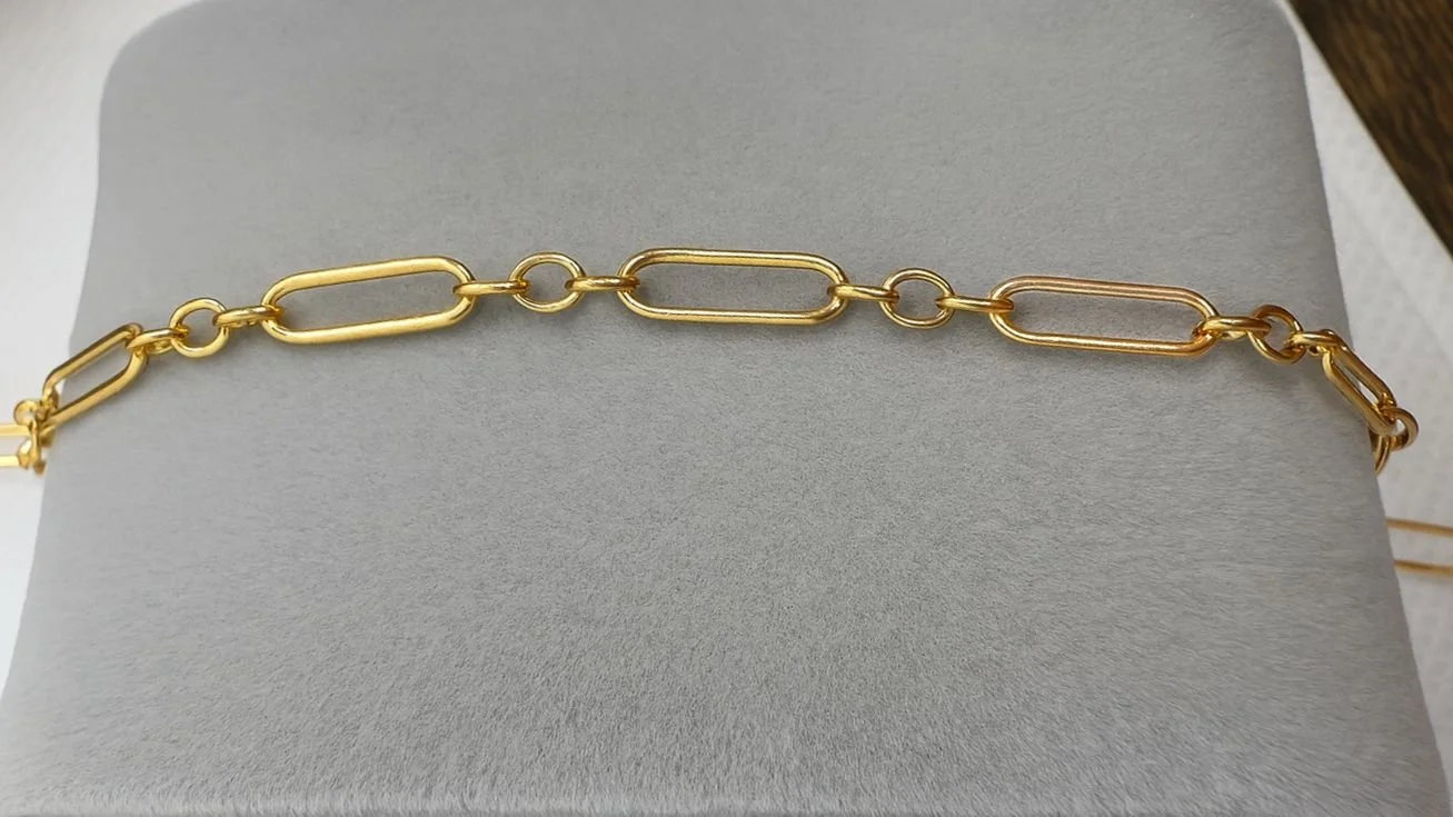 Elongated Oval Gold.jpg