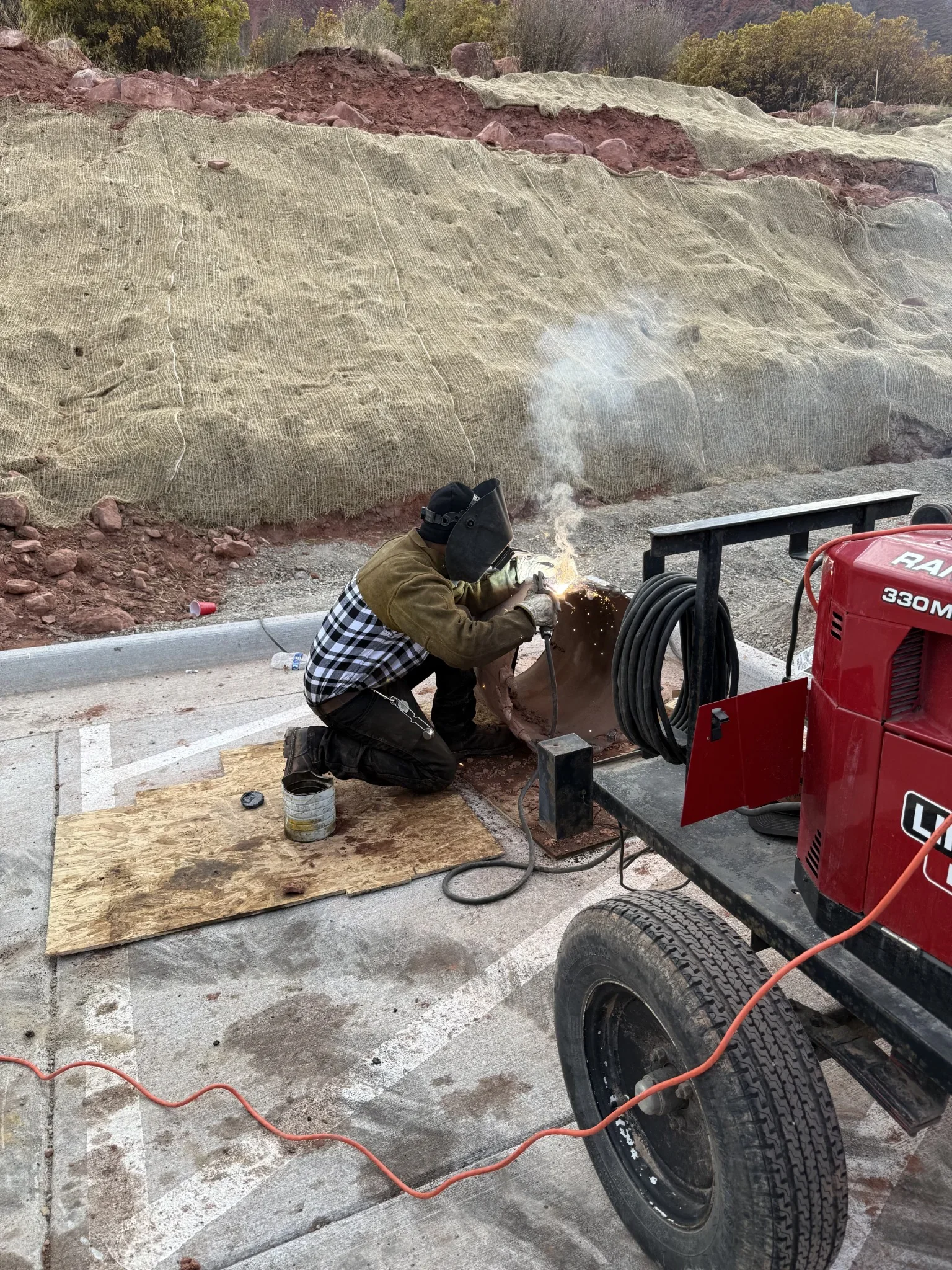 Perez Drilling operator welding and repairing foundation drilling tooling to maintain equipment for caisson drilling operations.