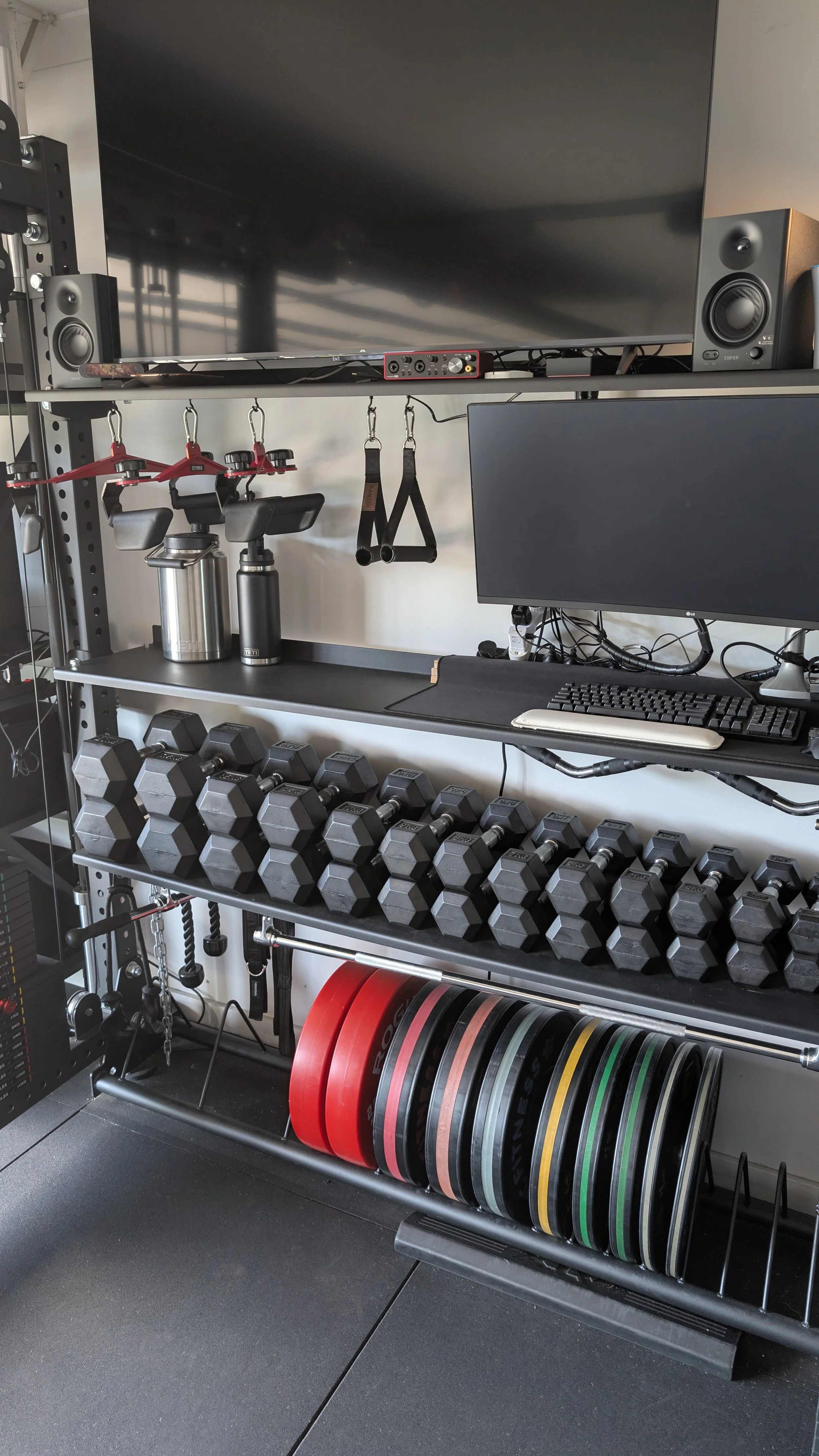 photo of dumbbells, bumper weight plates and cable attachments. A great set of equipment for amazing one on one personal training here in Pakenham, Victoria.