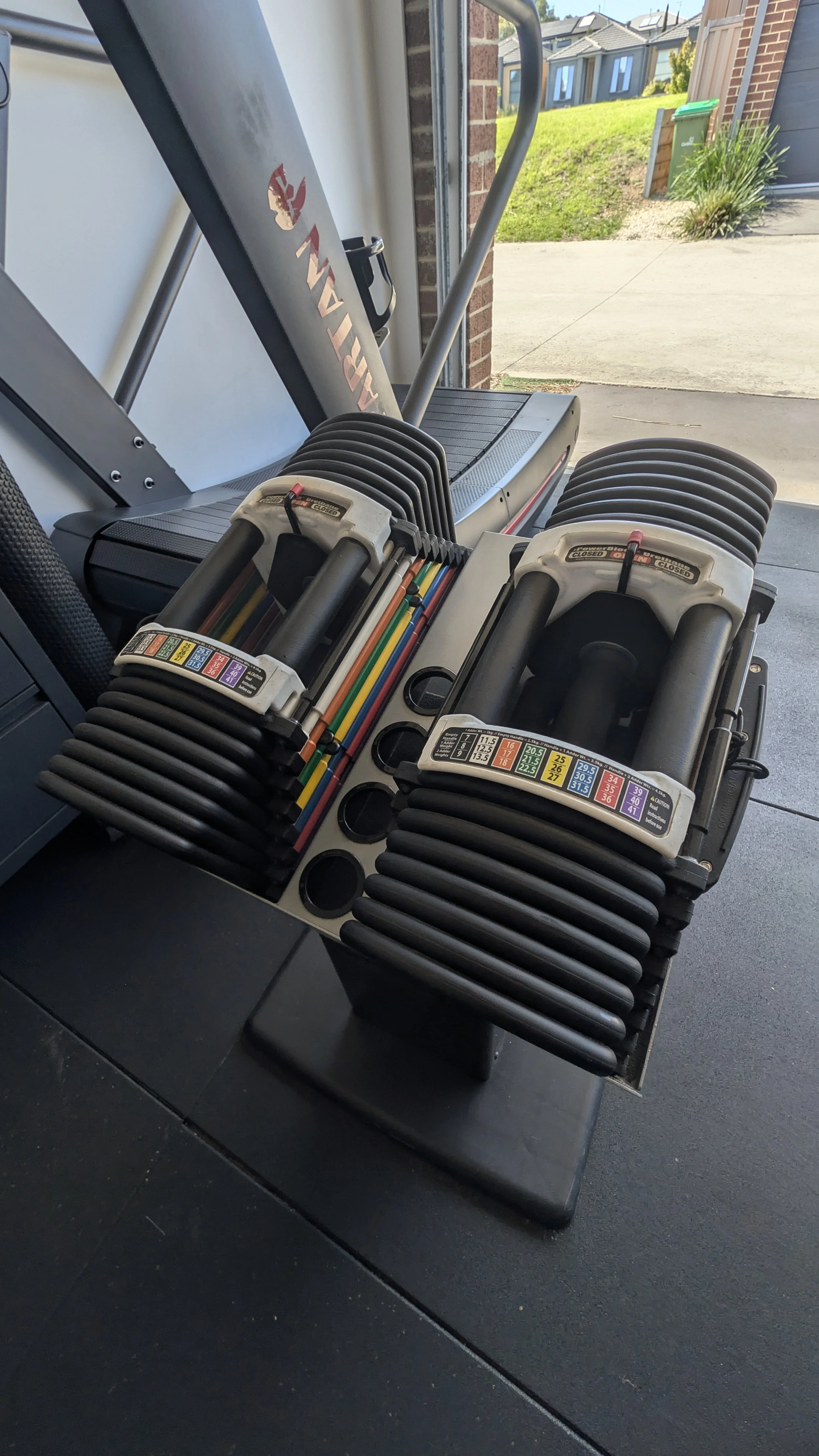 photo of PowerBlock Adjustable Dumbbells. up to 42.5kg in weight per Dumbbell. Heavier than the Rug and Rig adjustable dumbbells, but not as balanced or comfortable. I'd say the rug and rig DB's are better in a general sense.