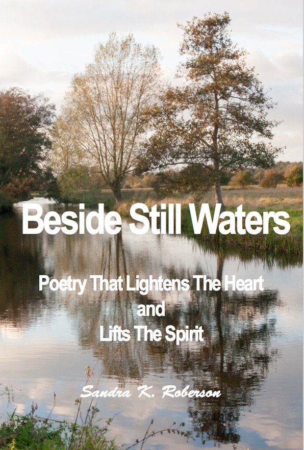 Book cover of 'Beside Still Waters' by Sandra K. Roberson featuring a serene waterside scene with trees reflecting in the water. The book is described as poetry that lightens the heart and lifts the spirit.