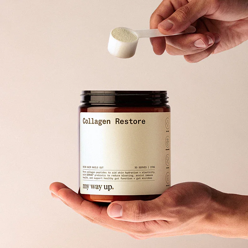 My Way Up Collagen Restore With Bimuno 270g hand scooping product with scoop