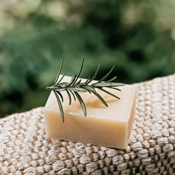 Natural shampoo bar 100g with botanical oils for gentle scalp nourishment and hair cleansing.