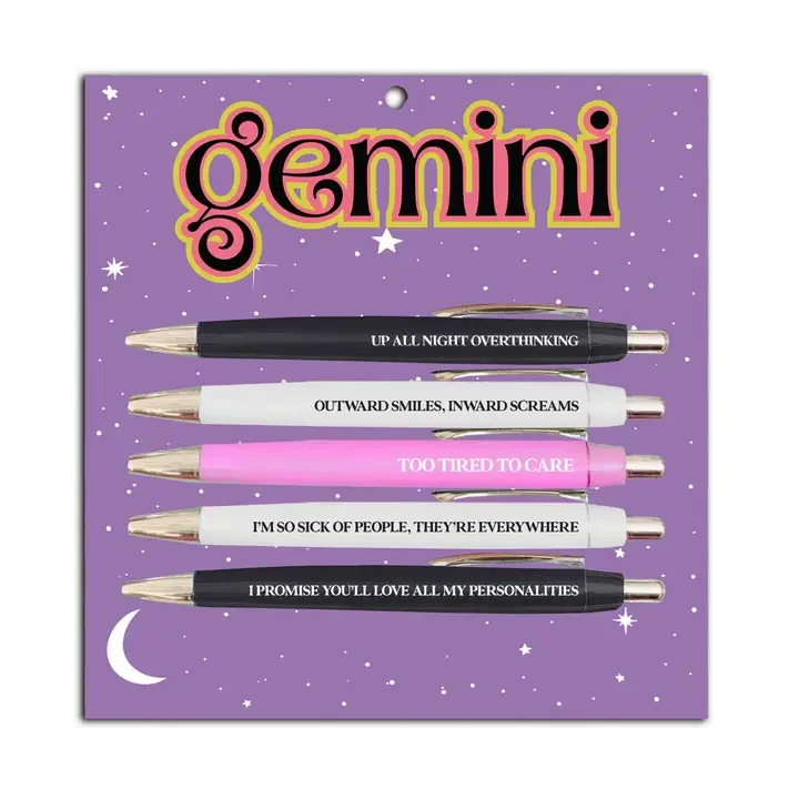 Gemini zodiac pen set with funny astrology phrases on purple celestial gift card packaging.webp