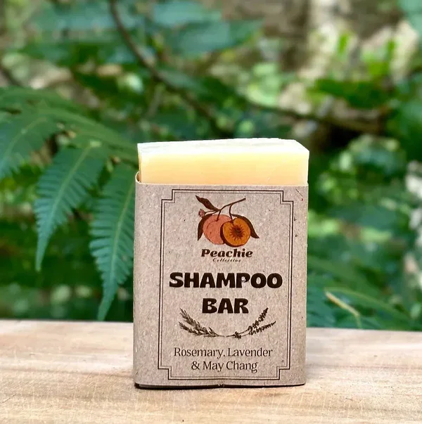 Eco-friendly Peachie Collective shampoo bar with rosemary, lavender & may chang essential oils — solid hair cleanser.