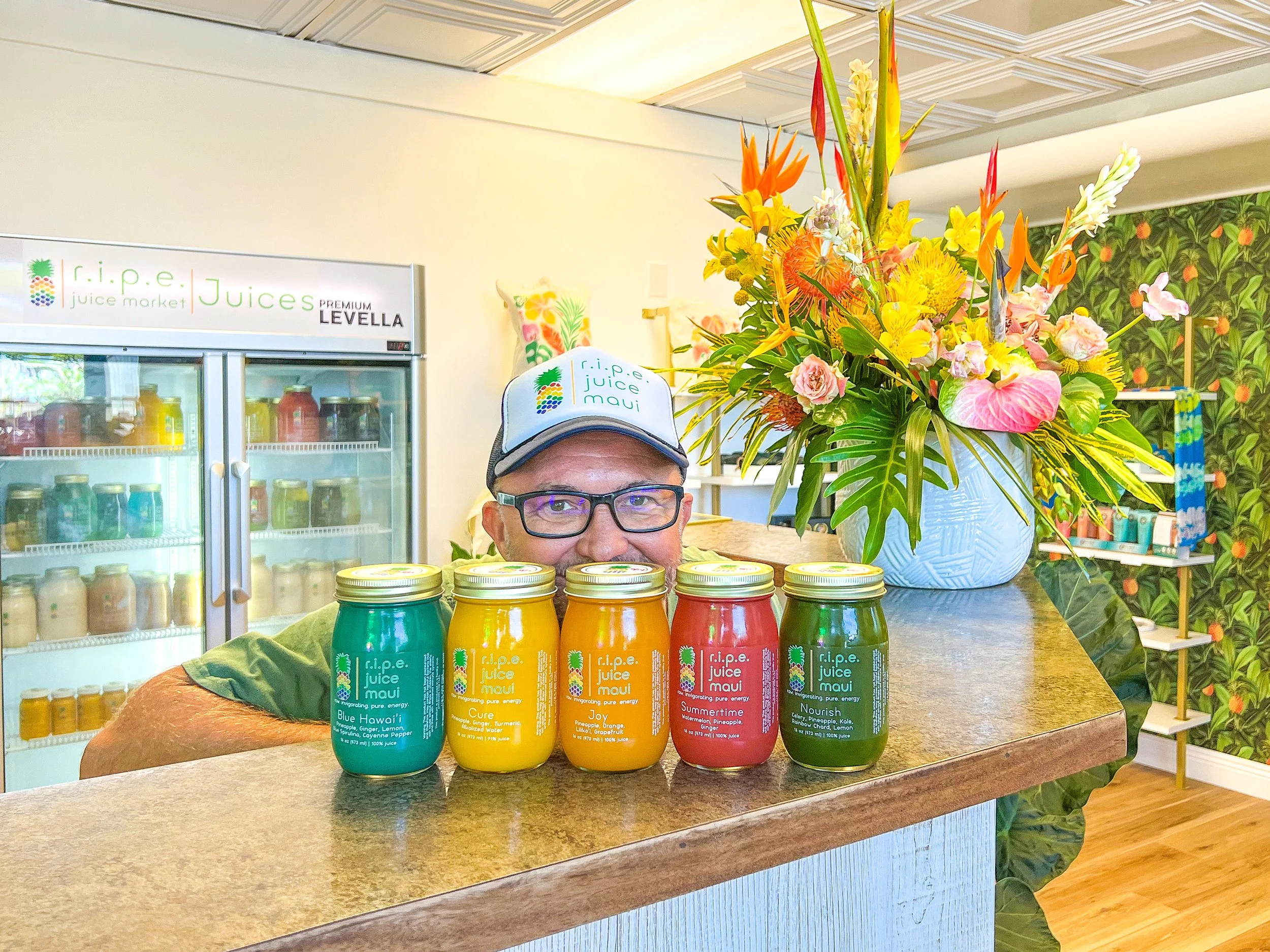 Brand created for ripe juice maui cold pressed juice business - logo - color palette - fonts - waterproof label design - packaging - photography - by Chrysalis Design Studio in Maui