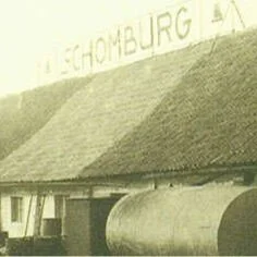 Vintage industrial building with rooftop sign