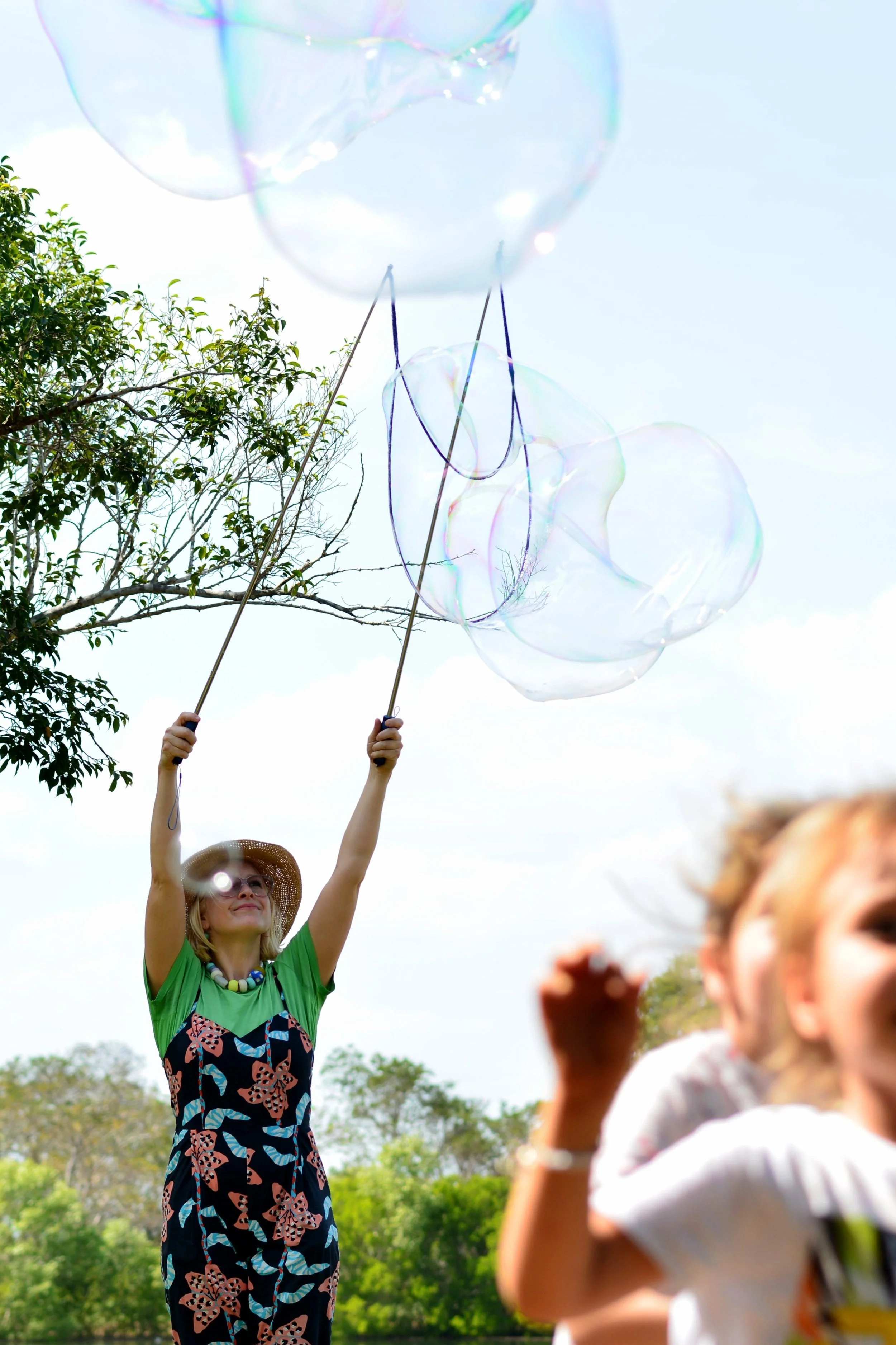 Children running for bubbles - Bubble Birthday Party at Lake Alexander 2024