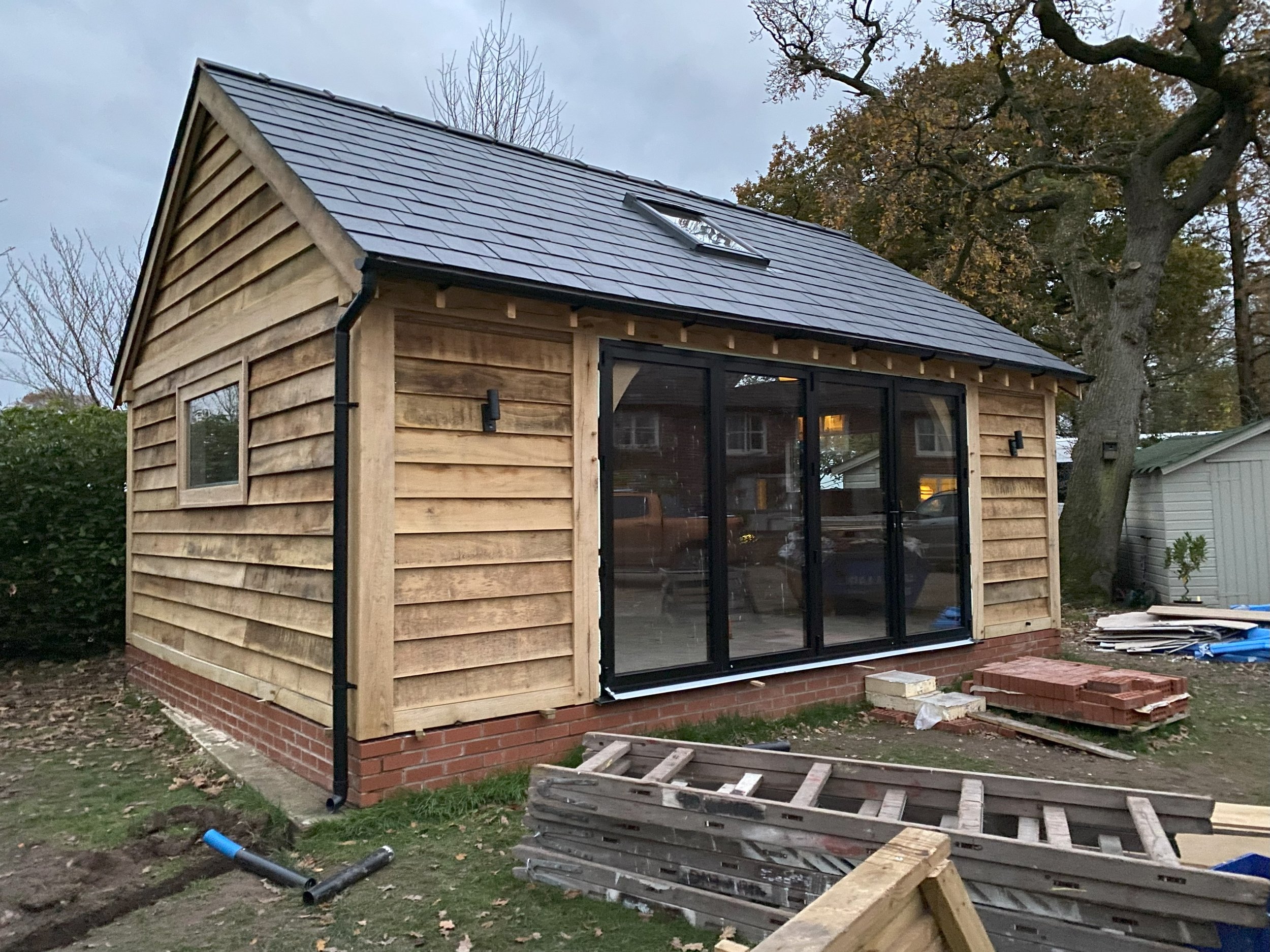 Oak Framed Office With Slate Roof and Bifold Doors